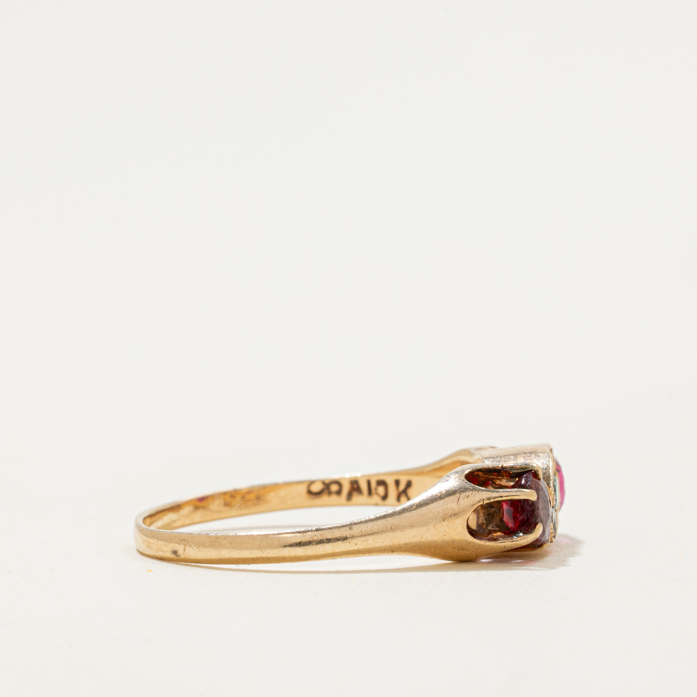 10k Synthetic Ruby & Diamond Accented Scrollwork Ring | 0.48ctw, 0.06ctw | SZ 6.5