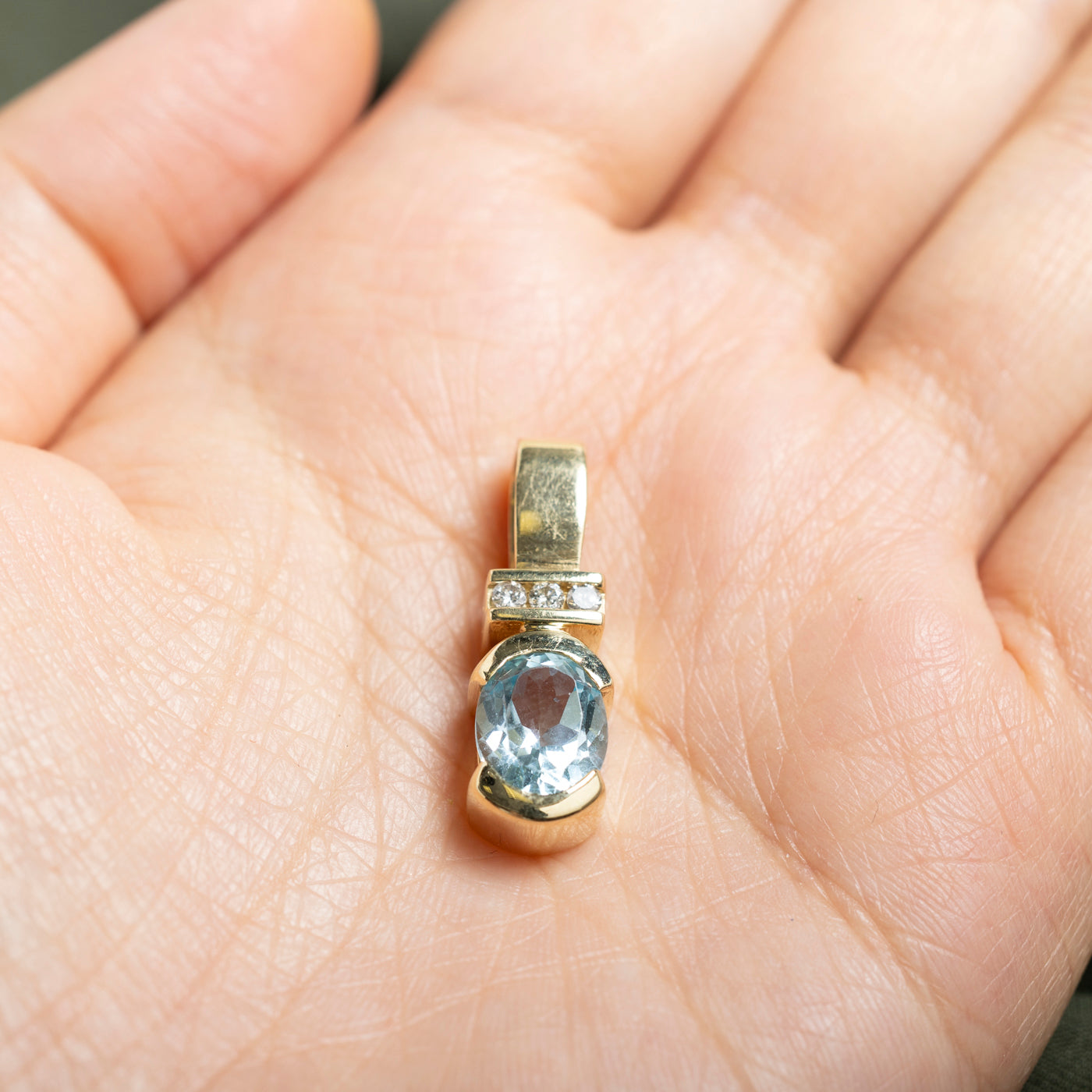 14k Oval Cut Blue Topaz & Diamond Accented Pendant | 3.33ct, 0.11ctw