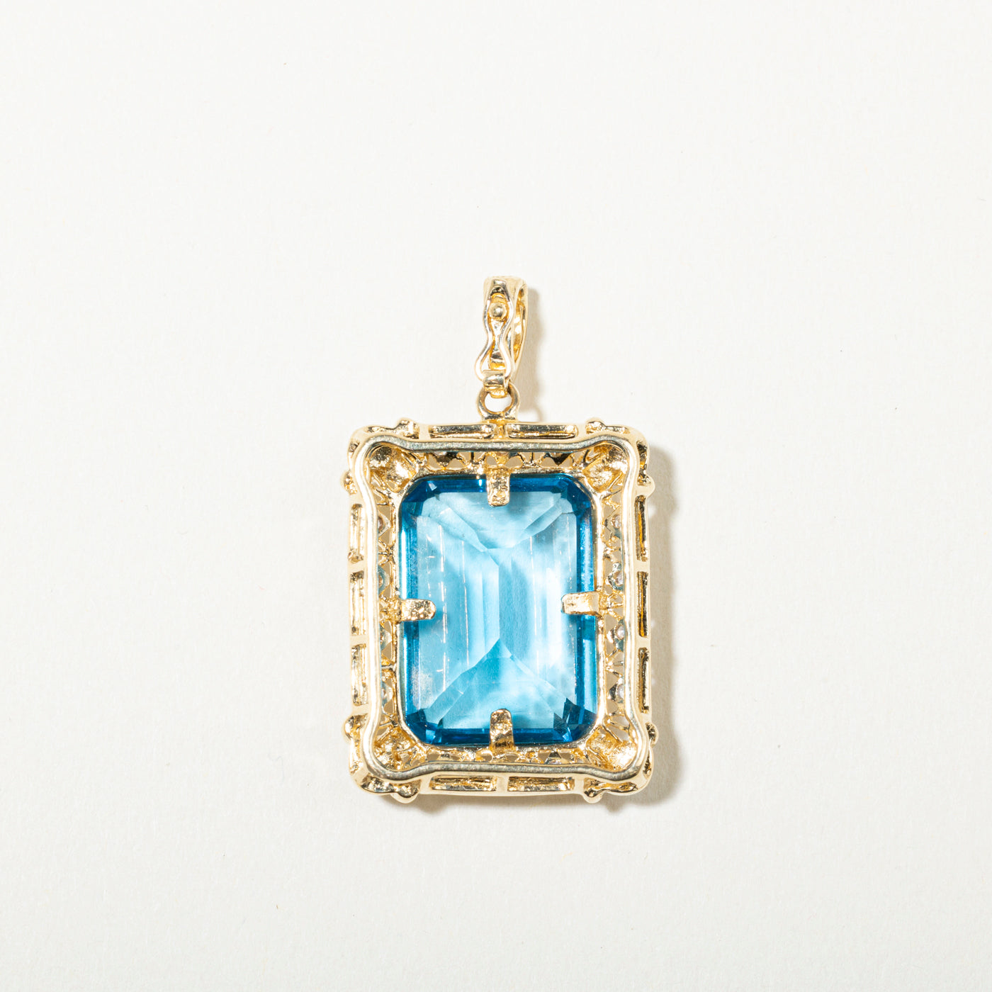 14k Blue Topaz & Diamond Ornate Halo Pendant | 21.42ct, 0.09ctw