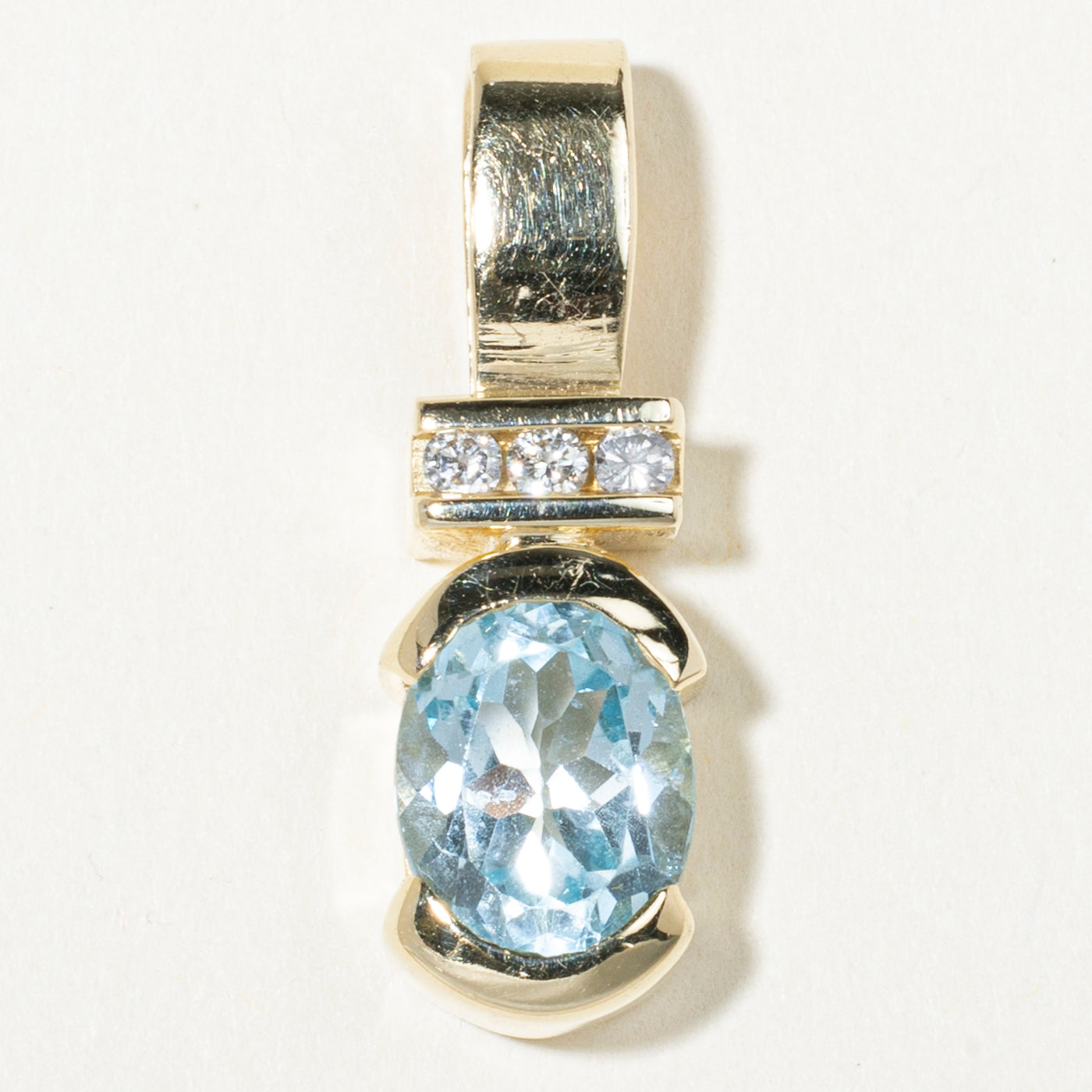 14k Oval Cut Blue Topaz & Diamond Accented Pendant | 3.33ct, 0.11ctw