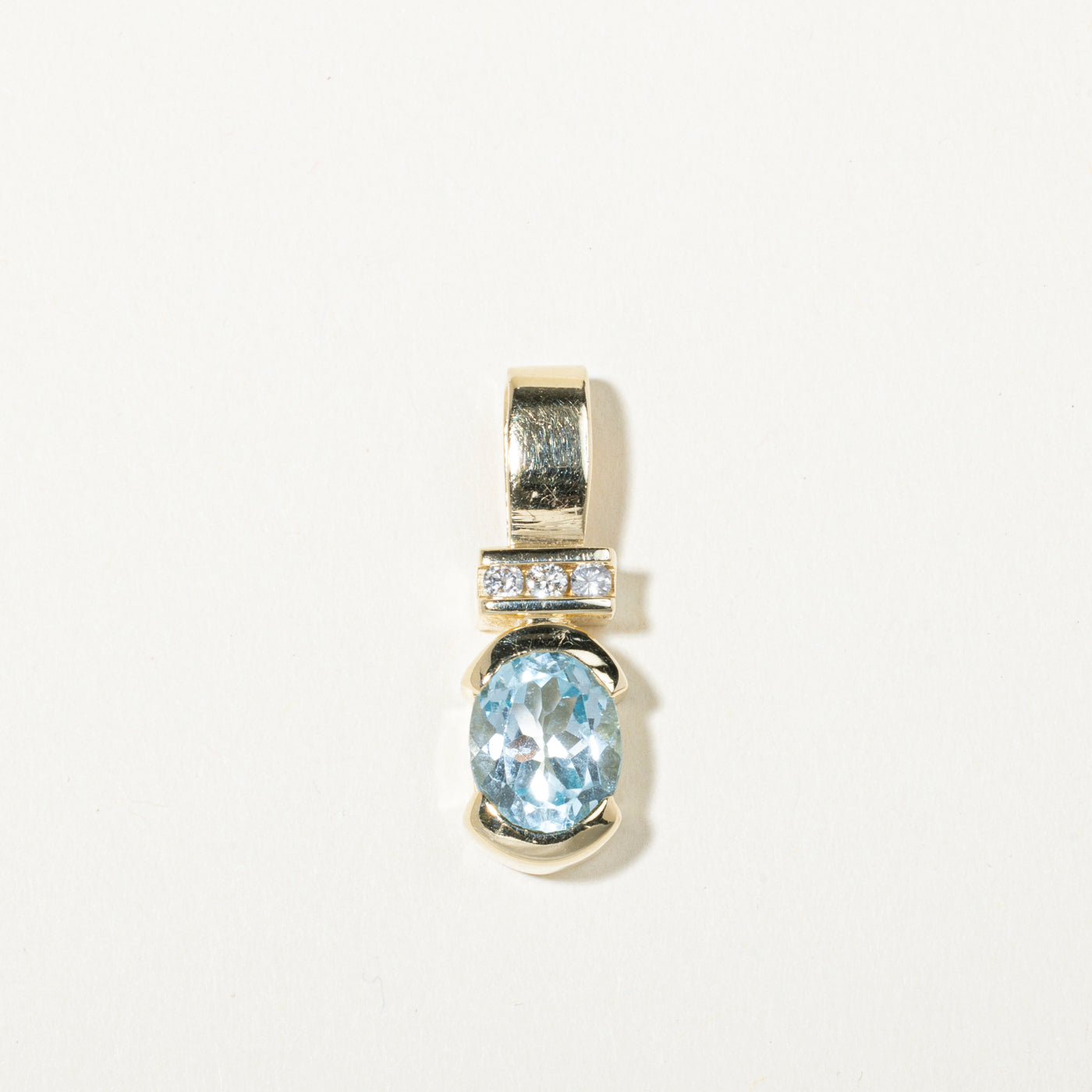 14k Oval Cut Blue Topaz & Diamond Accented Pendant | 3.33ct, 0.11ctw