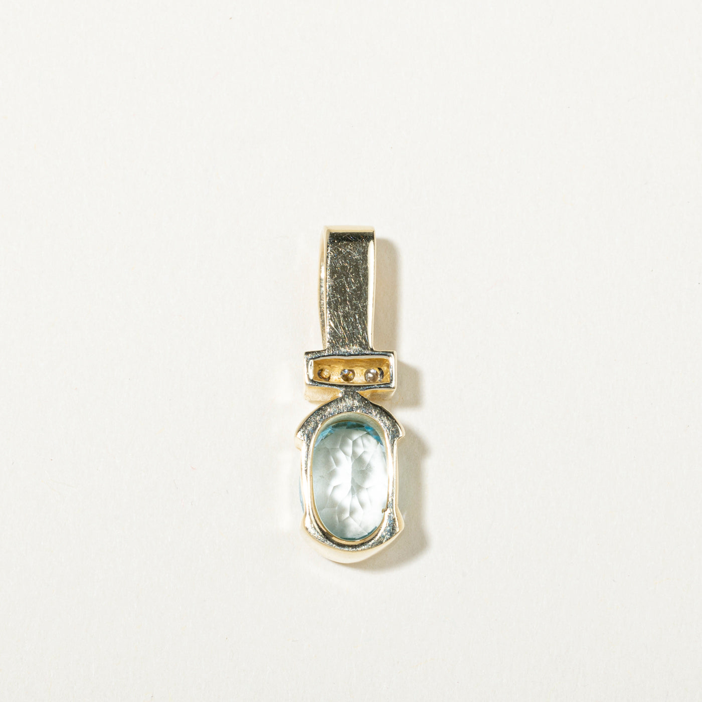 14k Oval Cut Blue Topaz & Diamond Accented Pendant | 3.33ct, 0.11ctw