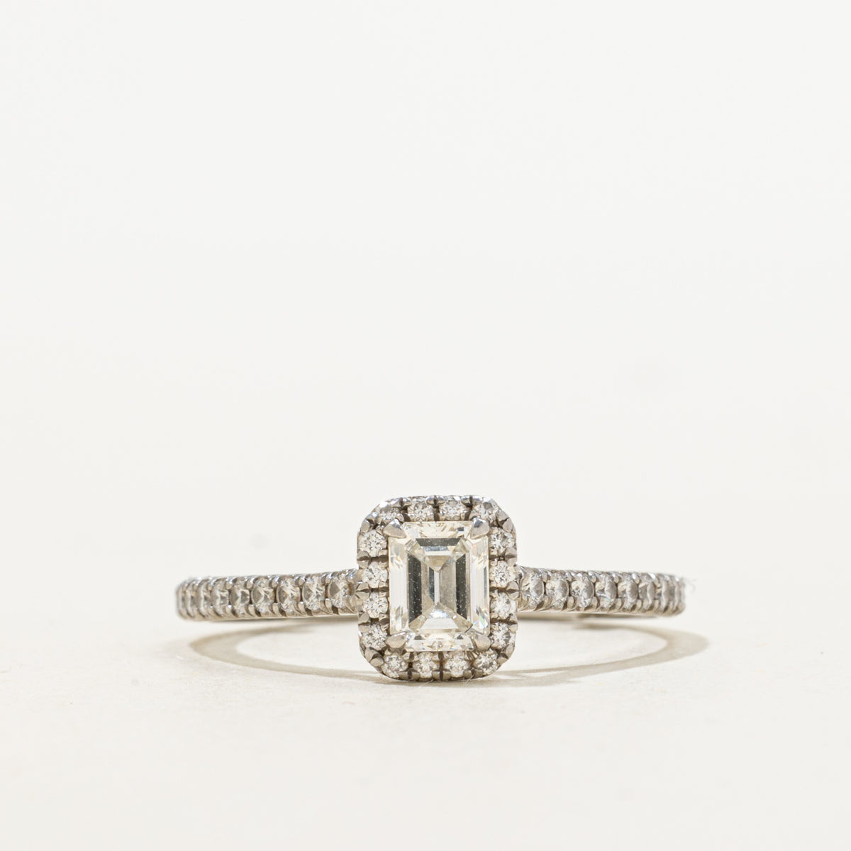 'Tiffany & Co.' Soleste Emerald-cut Halo Engagement Ring with a Diamond Platinum Band | 0.47ct VVS1 I Ex, 0.25ctw | SZ 4.75