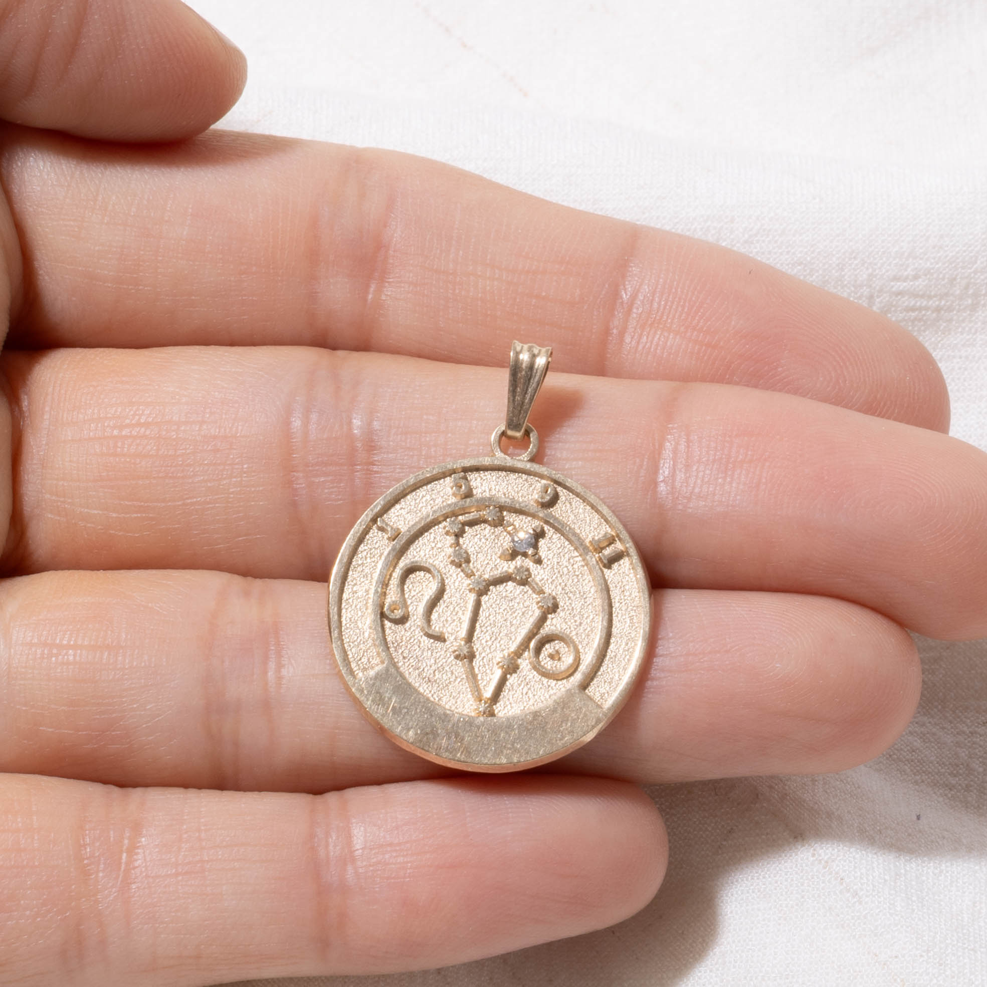 10k Diamond Leo Zodiac Pendant