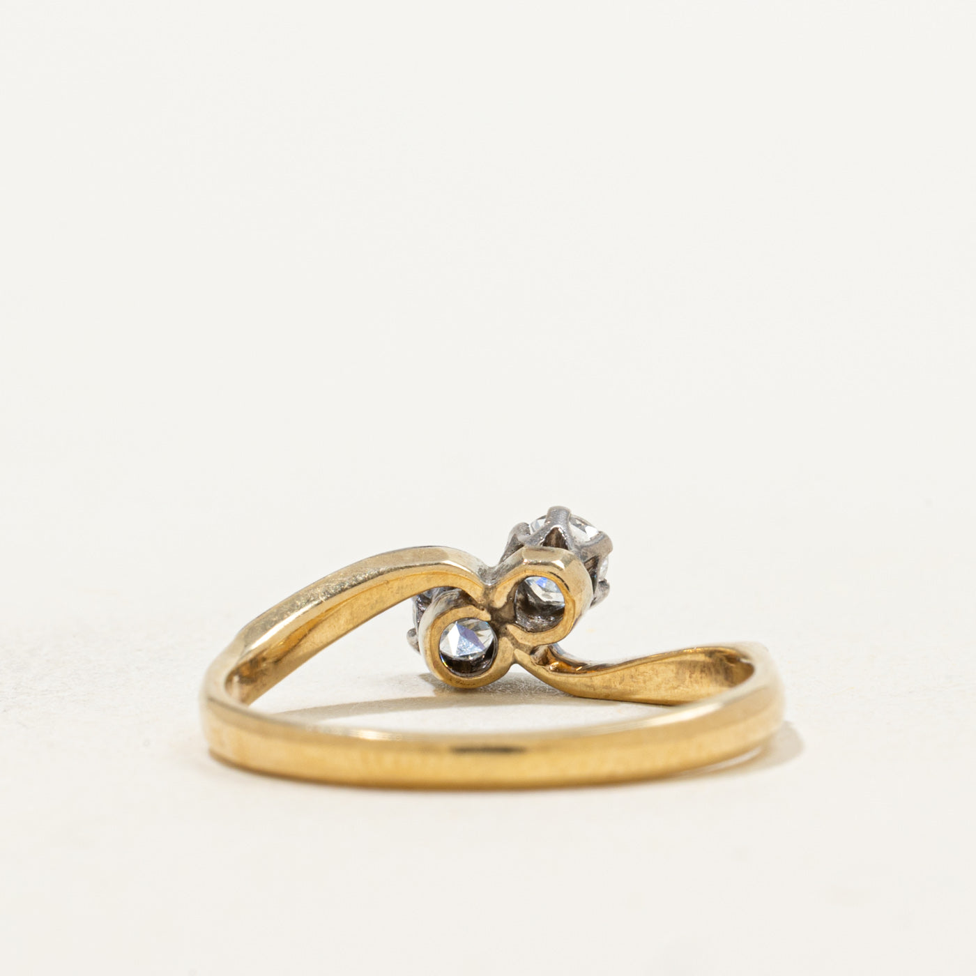 Early Art Deco 18k Transitional Cut Diamond Toi et Moi Ring | 0.23ctw