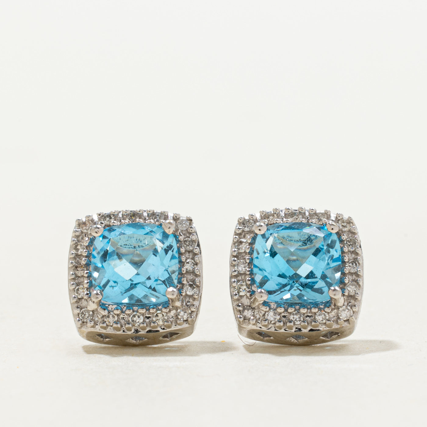 Blue Topaz & Diamond Halo Stud Earrings | 2.00ctw, 0.07ctw