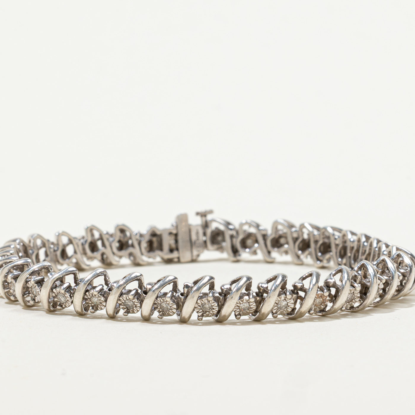 Sterling Silver Illusion Set Diamond Tennis Bracelet | 0.34ctw | 7"