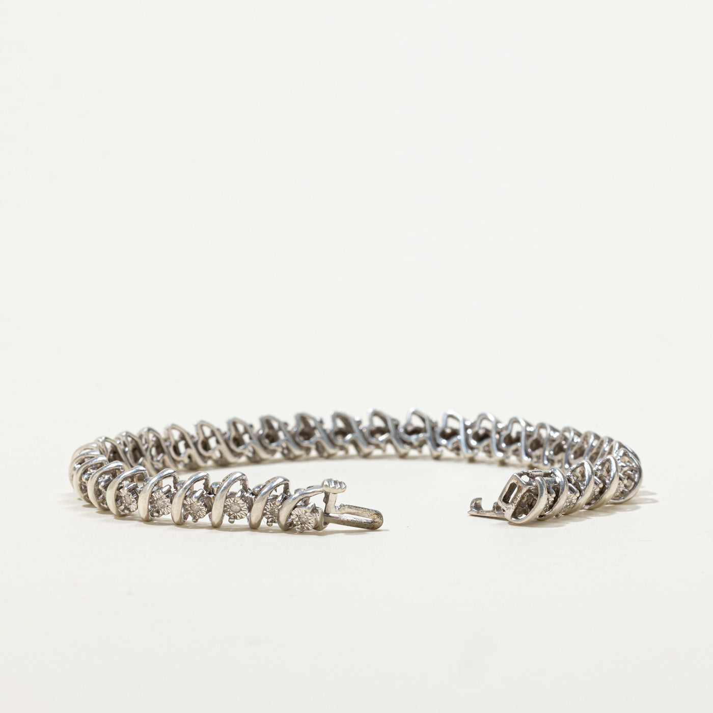 Sterling Silver Illusion Set Diamond Tennis Bracelet | 0.34ctw | 7"