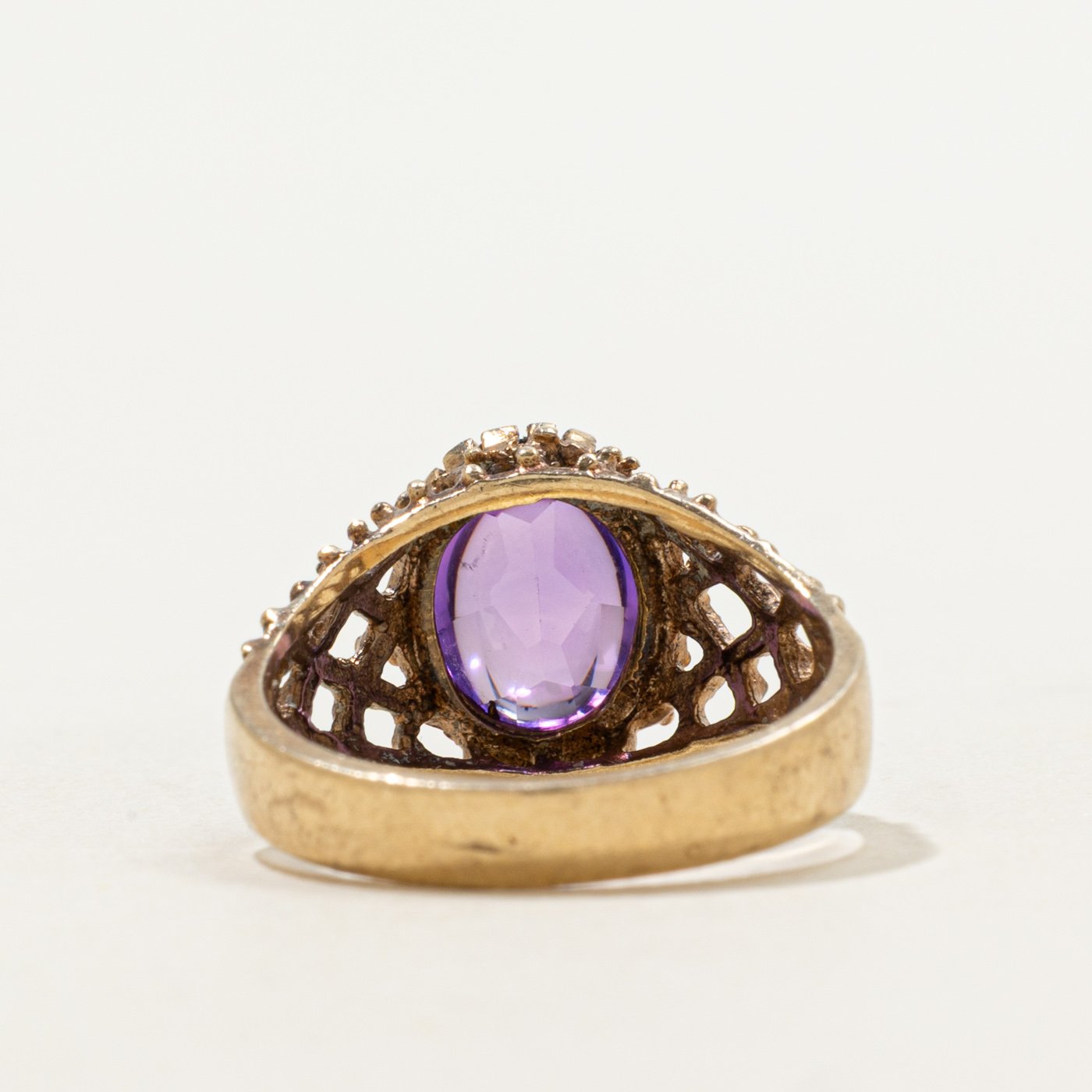 10K Ring with Oval Buff Cut Synthetic Sapphire