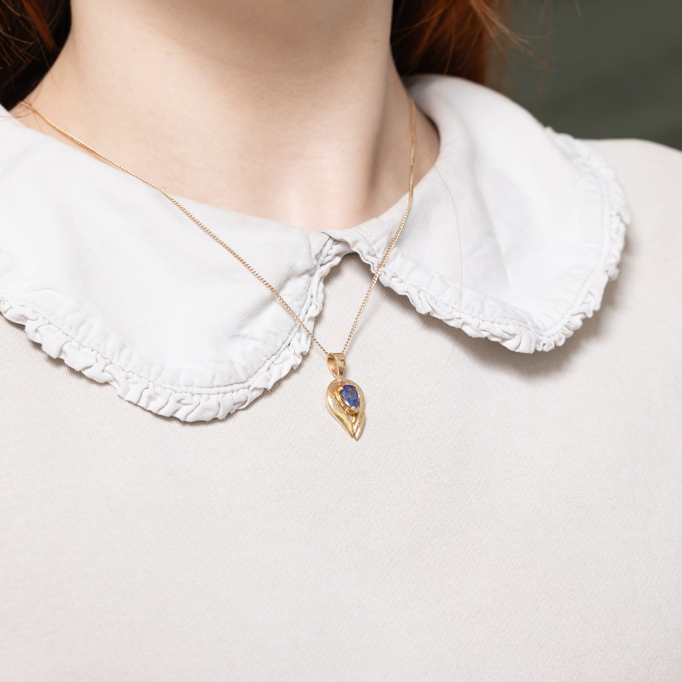 14K Pear Cut Tanzanite Abstract Pendant | 0.90ct