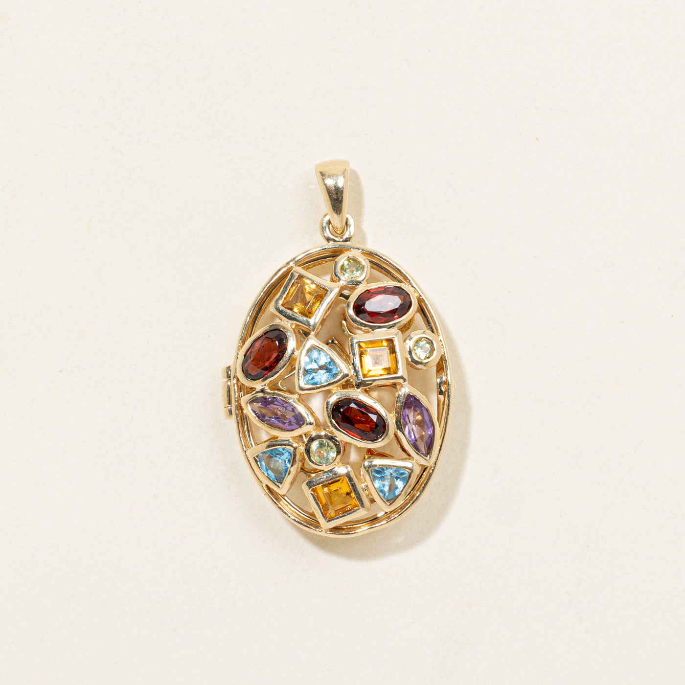 Pendentif en or 10 carats serti de plusieurs pierres précieuses | 2,00 ct au total