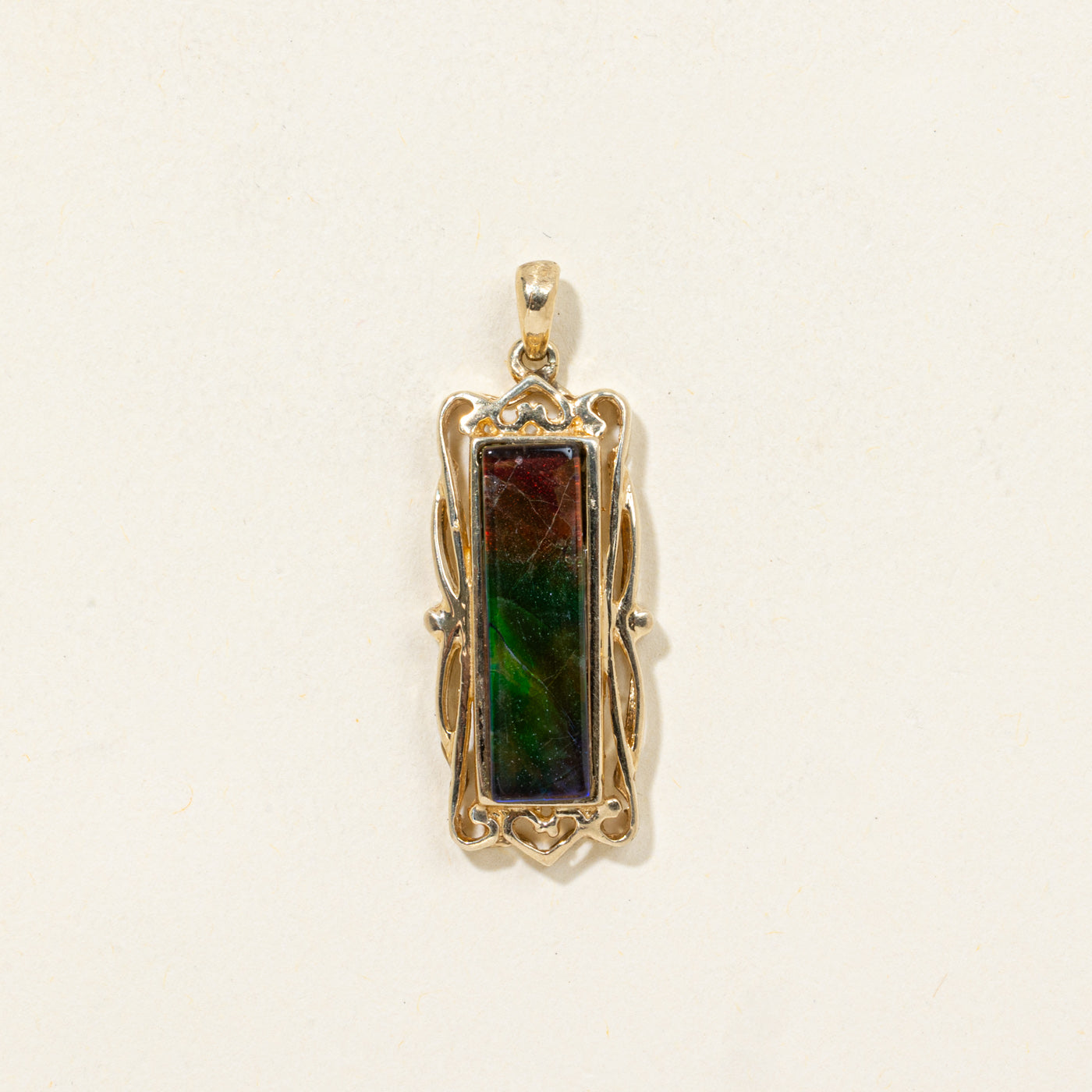 Pendentif barrette en ammolite sertie clos en or 14 carats | 3,00 ct