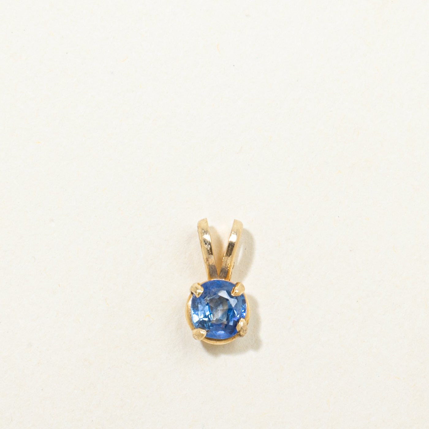 14k Solitaire Round Cut Sapphire Pendant | 0.56ct