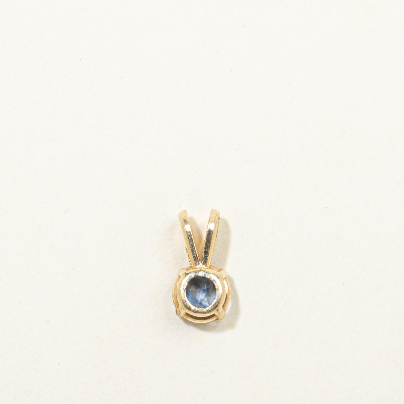 14k Solitaire Round Cut Sapphire Pendant | 0.56ct