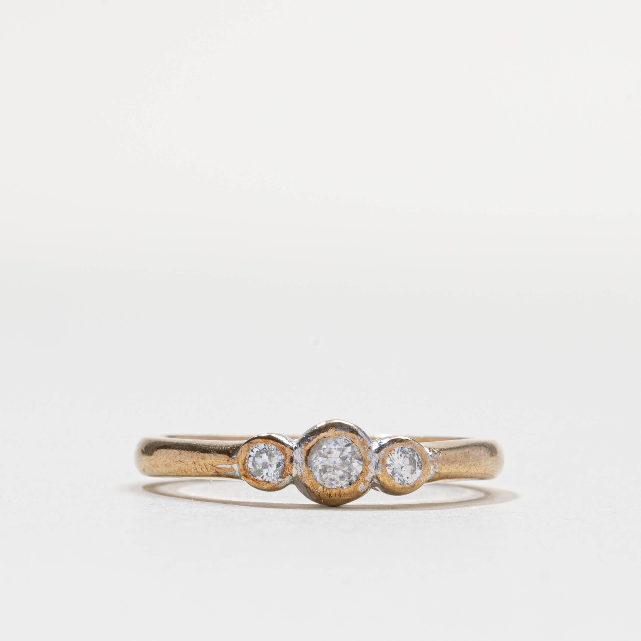 2000 London Bezel Set Three Stone Diamond Ring | 0.2ctw | SZ 6.75