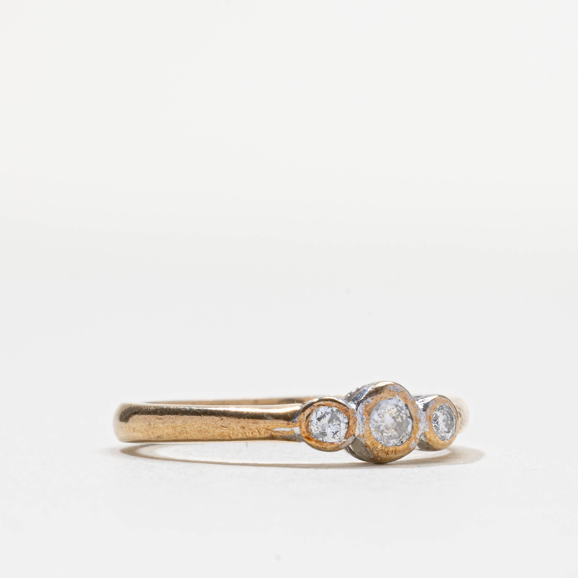 2000 London Bezel Set Three Stone Diamond Ring | 0.2ctw | SZ 6.75