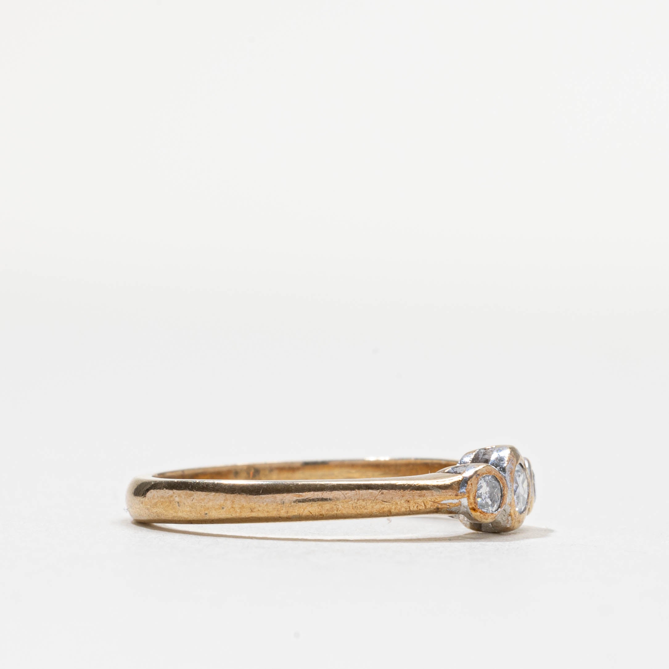2000 London Bezel Set Three Stone Diamond Ring | 0.2ctw | SZ 6.75