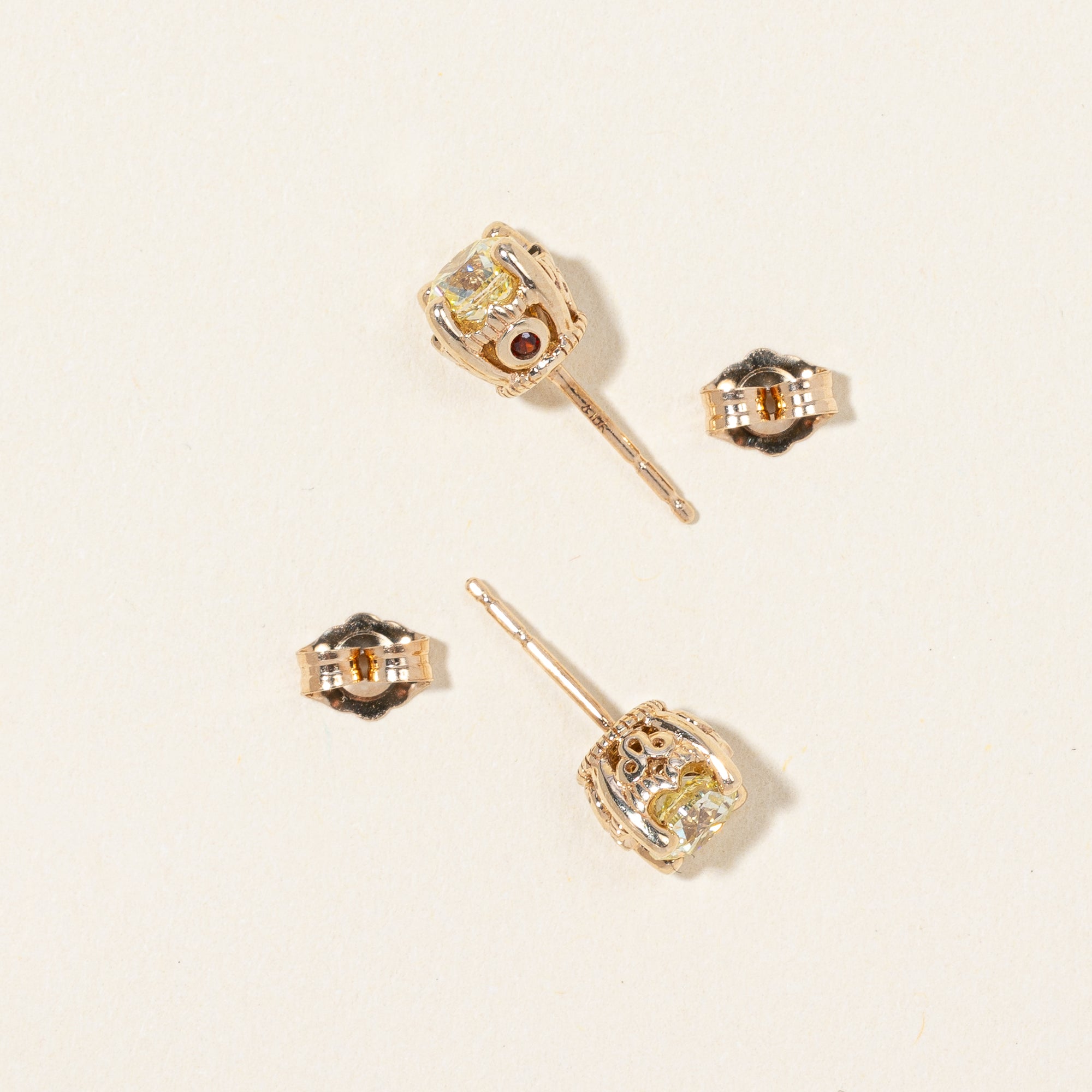 Diamond & Garnet Stud Earrings | 0.90ctw, 0.04ctw |