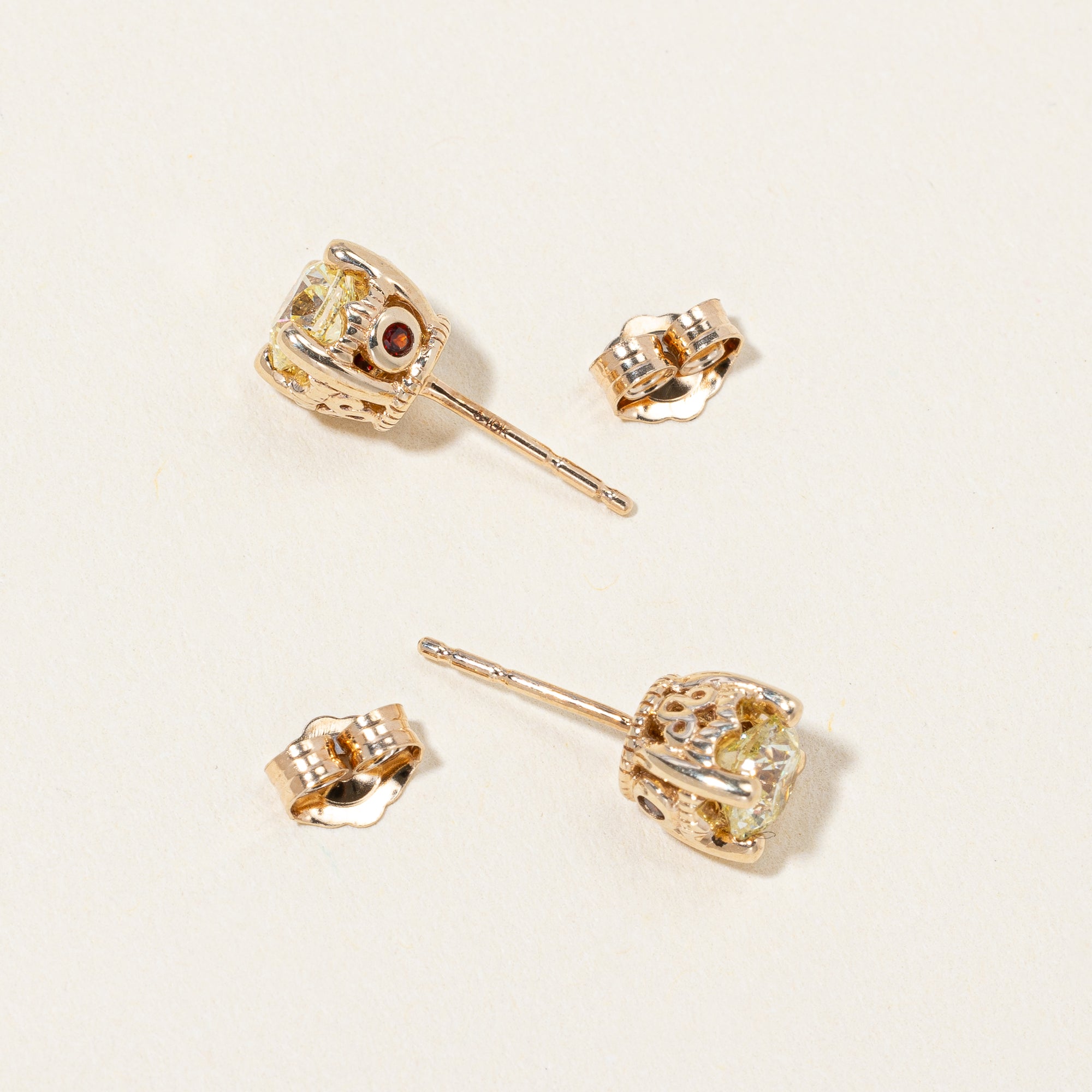 Diamond & Garnet Stud Earrings | 0.90ctw, 0.04ctw |