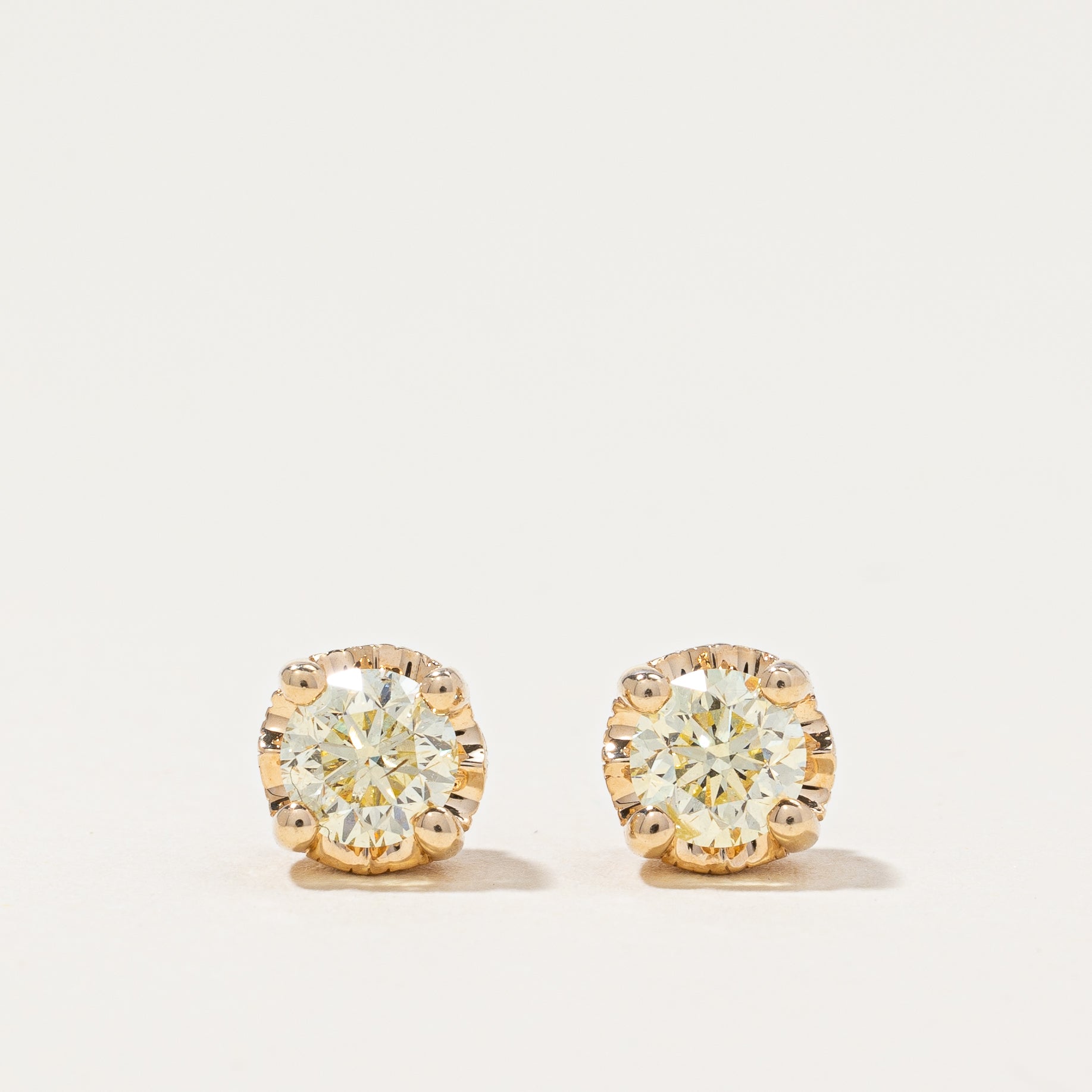 Diamond & Garnet Stud Earrings | 0.90ctw, 0.04ctw |