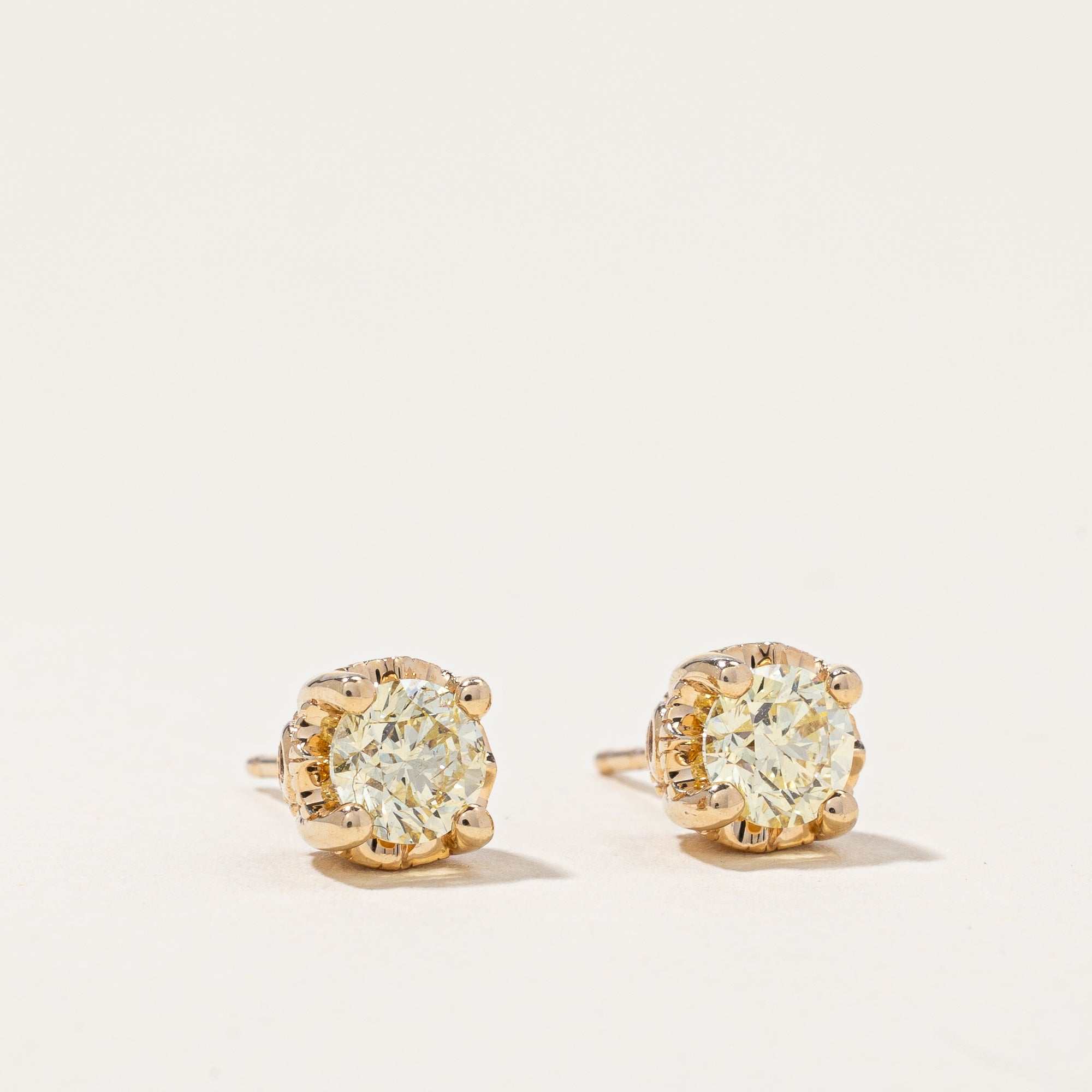 Diamond & Garnet Stud Earrings | 0.90ctw, 0.04ctw |