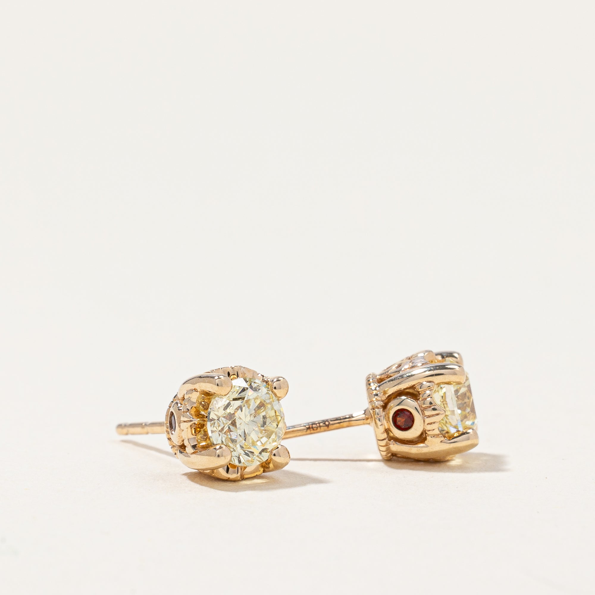 Diamond & Garnet Stud Earrings | 0.90ctw, 0.04ctw |