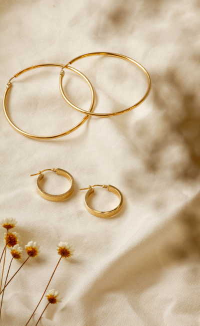 Pairs of yellow gold hoop earrings, vintage, preloved and sustainably sourced
