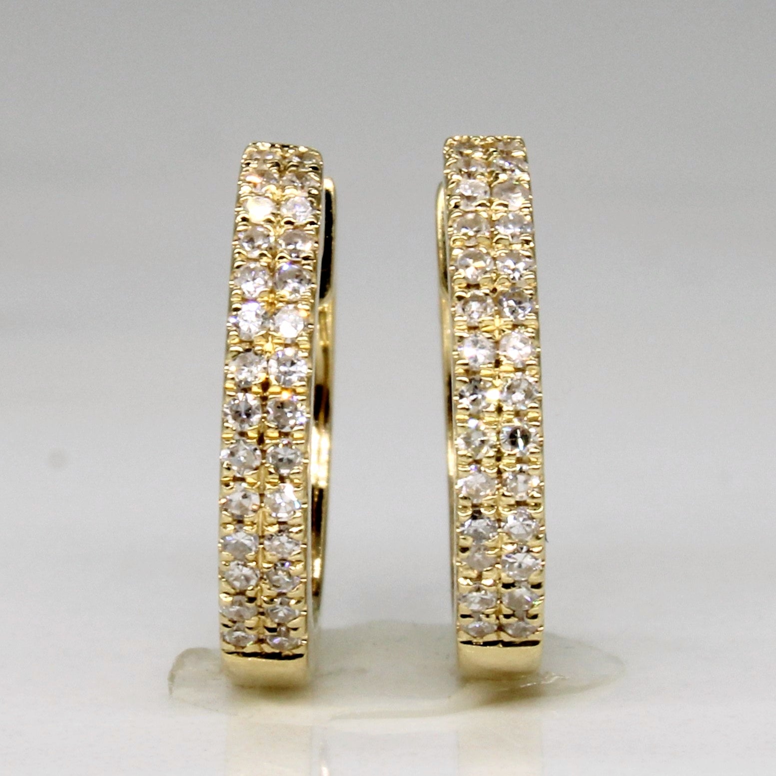 Boucles d'oreilles créoles en or jaune et diamants | 0,14 ct au total | 