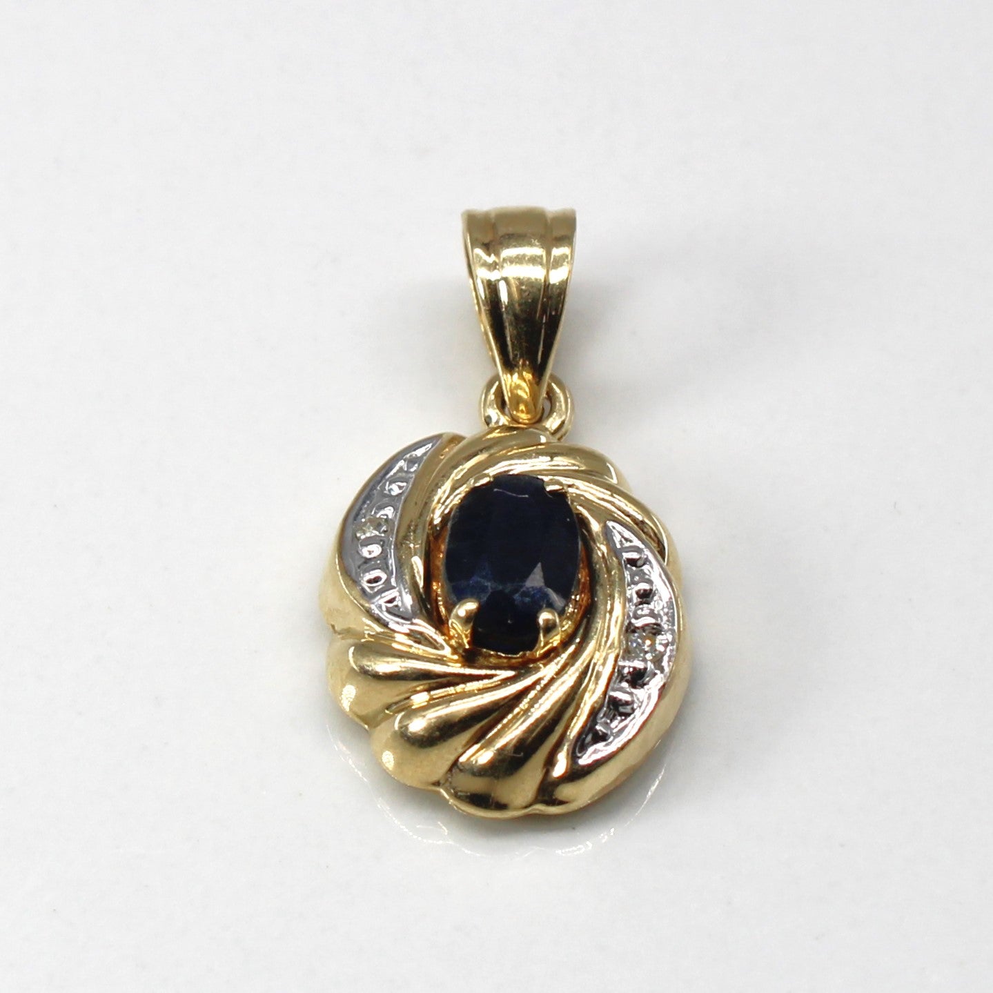 Sapphire & Diamond Swirl Gold Pendant | 0.50ct | 0.01ctw |