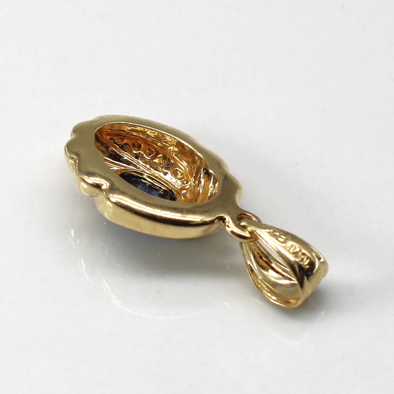 Sapphire & Diamond Swirl Gold Pendant | 0.50ct | 0.01ctw |