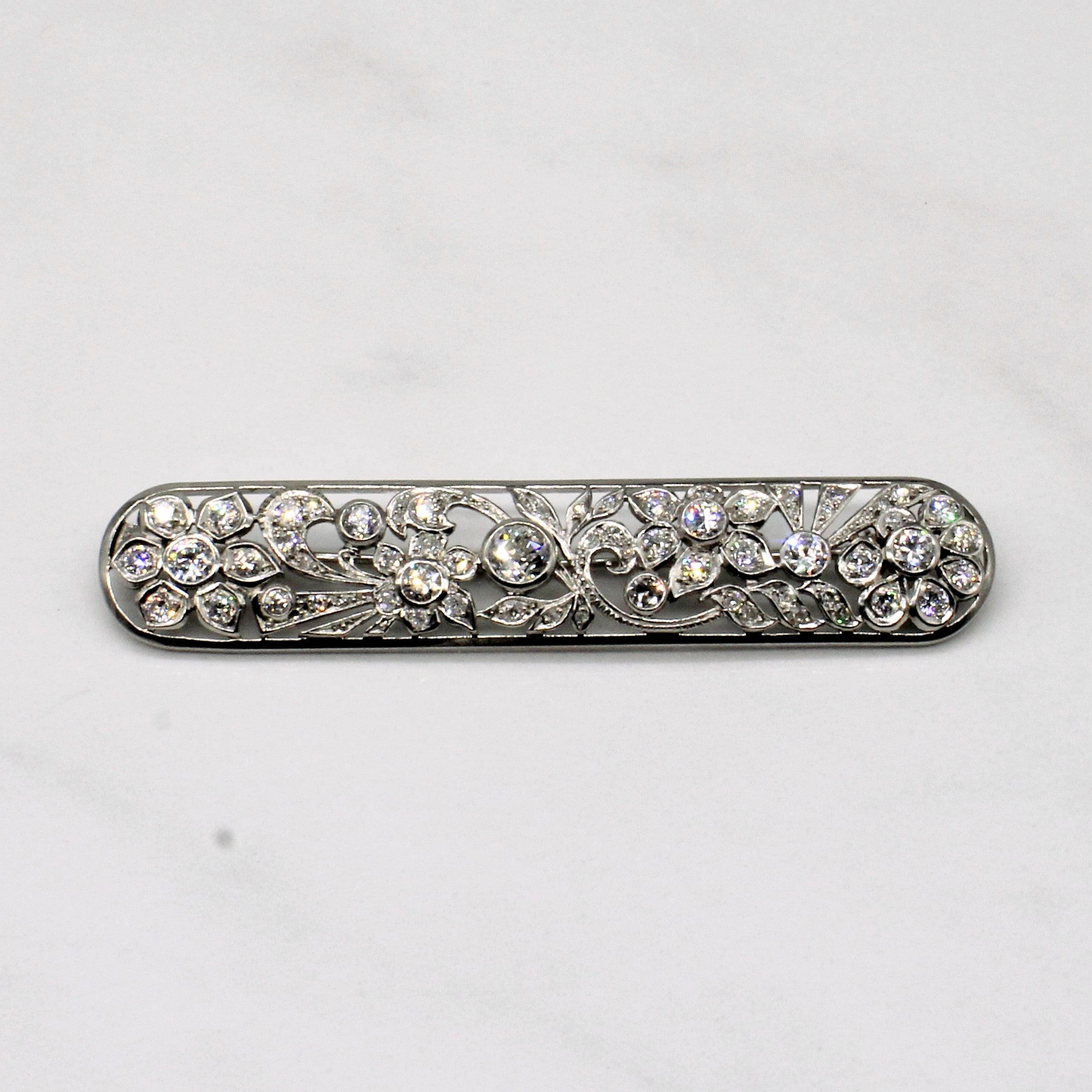Vintage Pierced Platinum Flower and Leaf Old European Diamond Brooch | 0.39ctw, 1.88ctw, 0.44ctw |