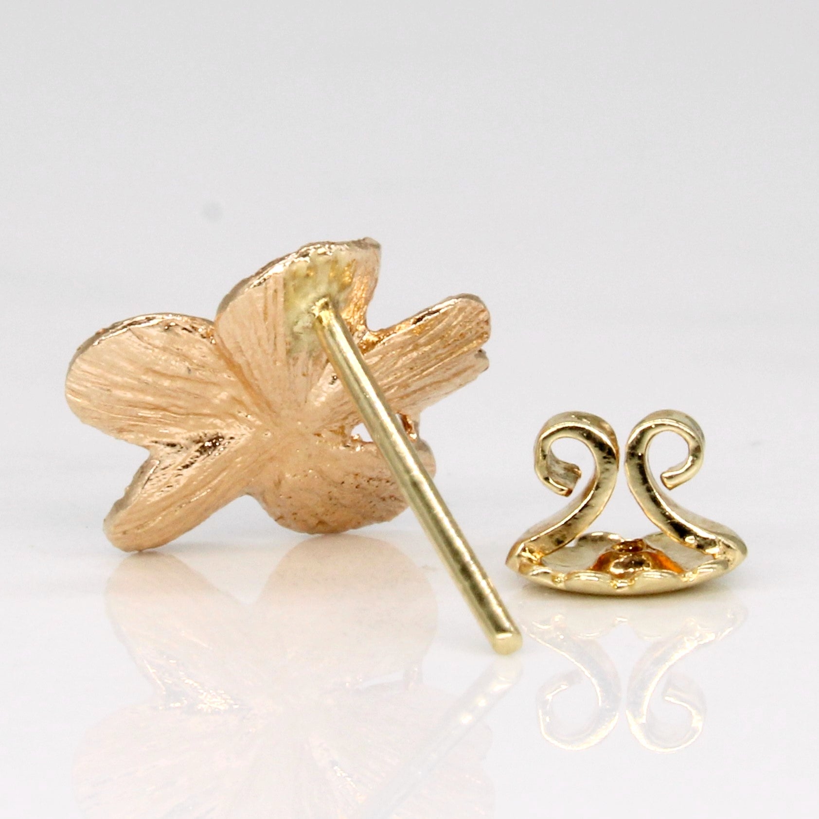 Boucles d'oreilles en forme de fleur serties de diamants chocolat | 0,06 ct | 