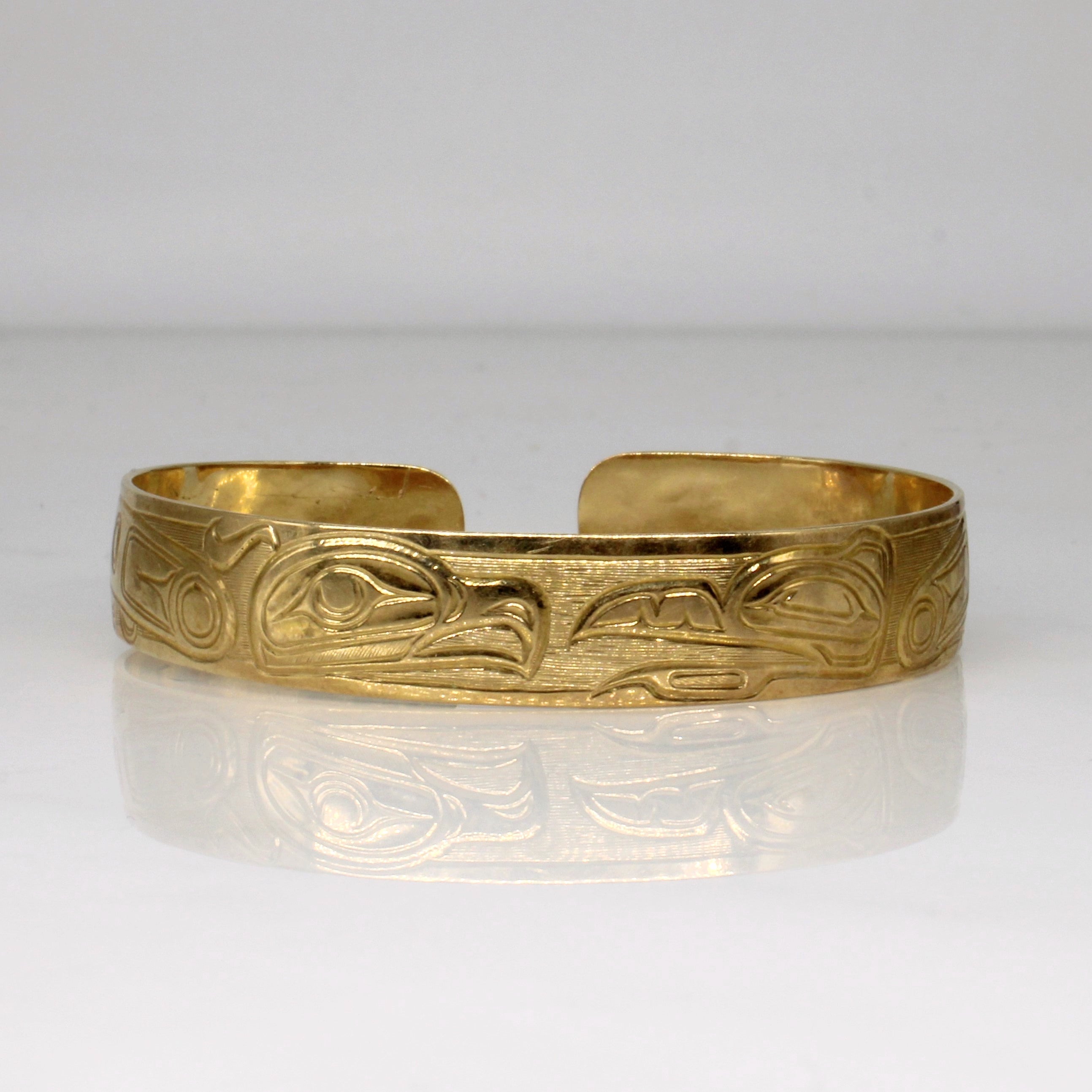 Bracelet jonc en or jaune 10 carats représentant un aigle autochtone | 15 cm | 