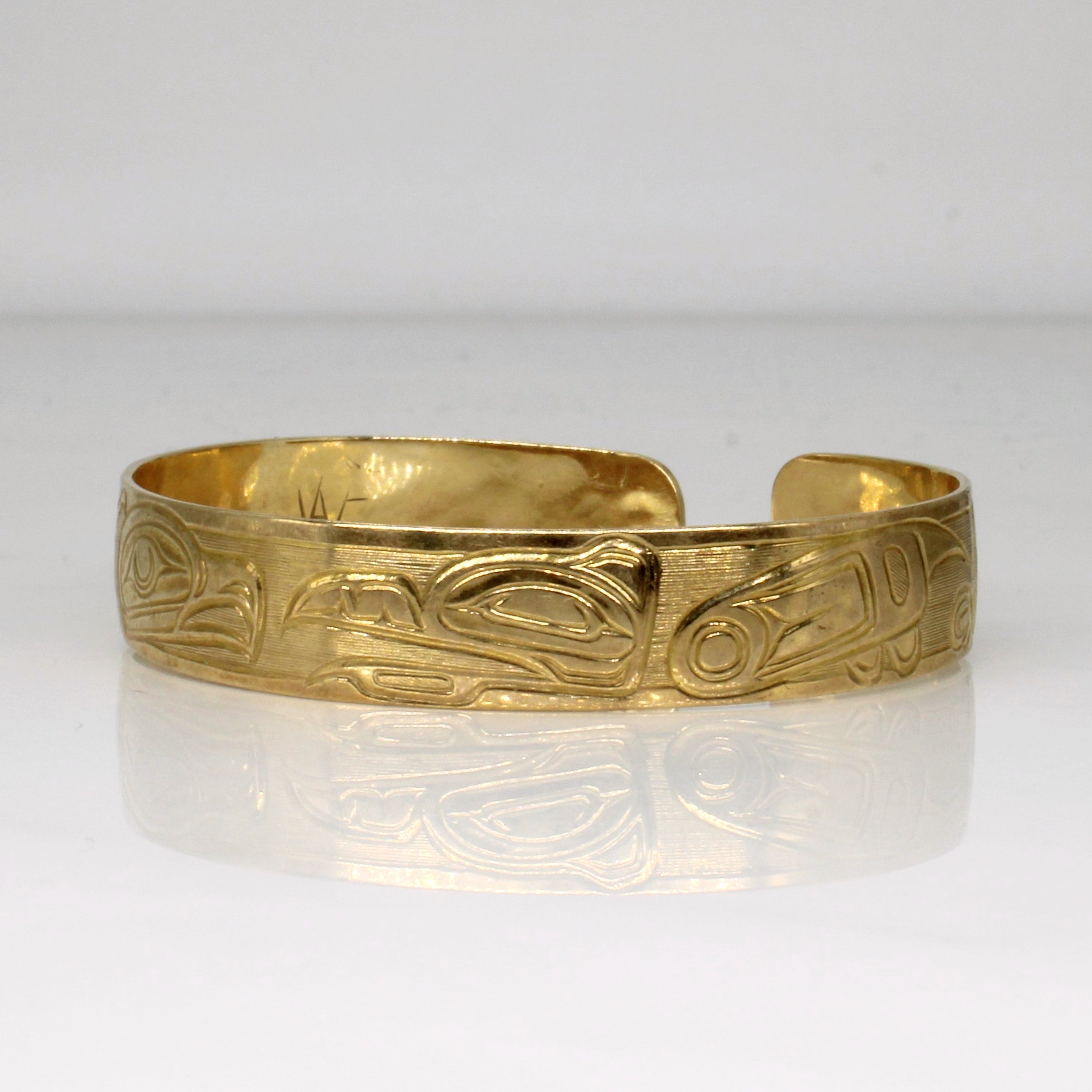 Bracelet jonc en or jaune 10 carats représentant un aigle autochtone | 15 cm | 
