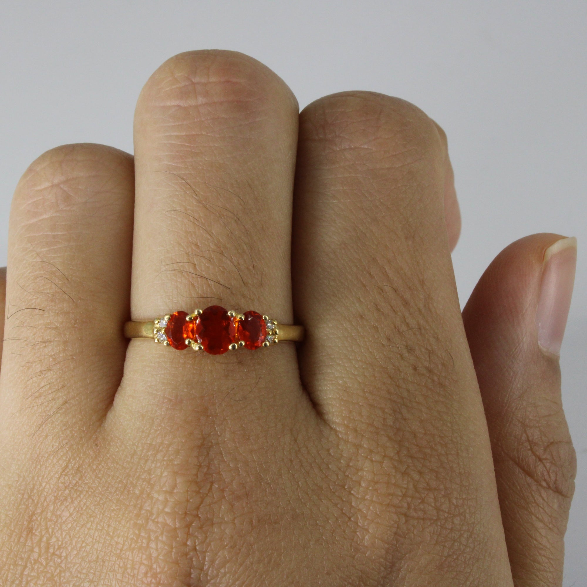 Three Stone Mandarin Garnet & Diamond Ring | 0.75ctw | 0.02ctw | SZ 7.75 |