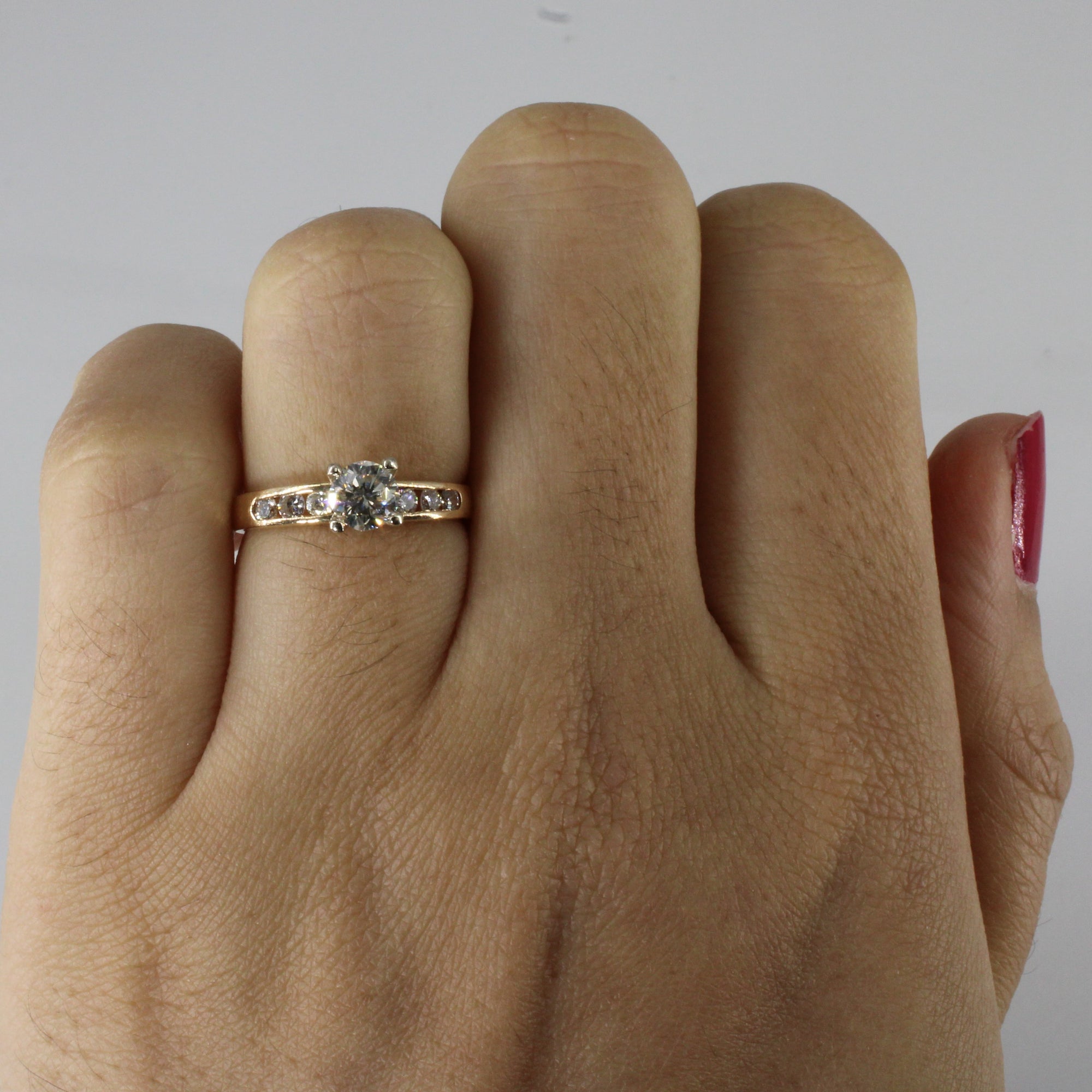 Solitaire with Channel Accents Diamond Engagement Ring | 0.64ctw | SZ 4.5 |