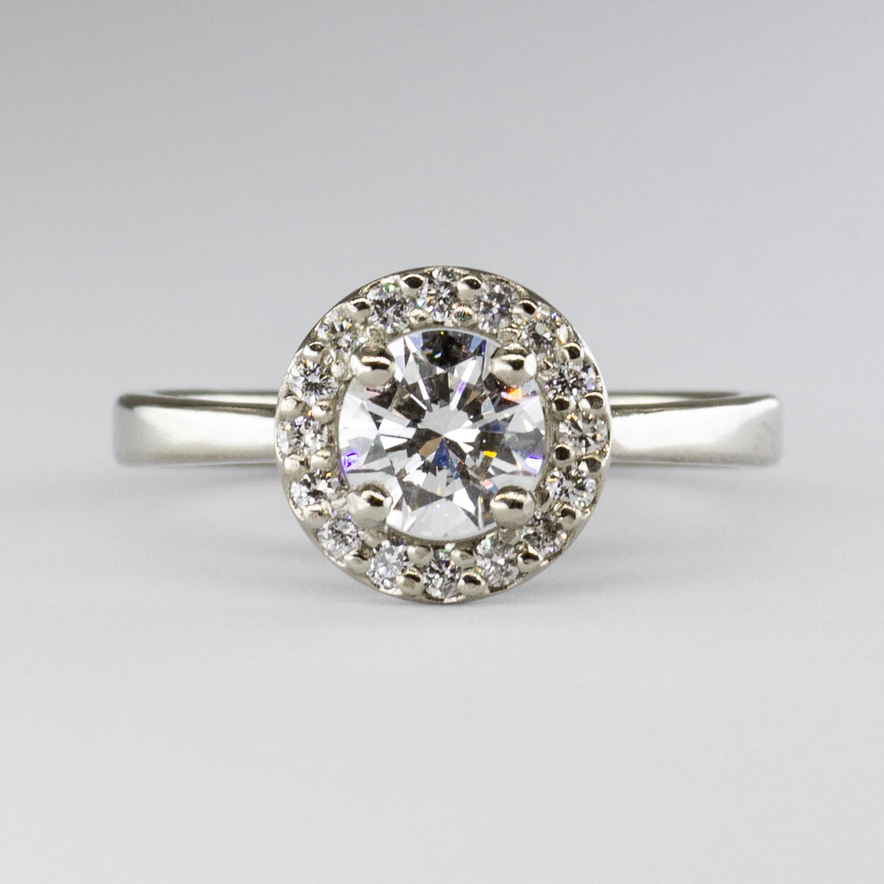 '100 Ways' GIA Certified Diamond Halo 18k Ring | 0.71 ct SI1 G, 0.16ctw | SZ 5.75