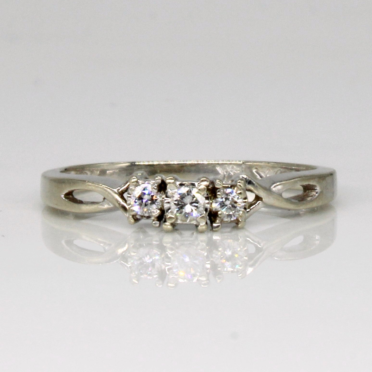 Three Stone Diamond Ring | 0.11ctw | SZ 6.5 |