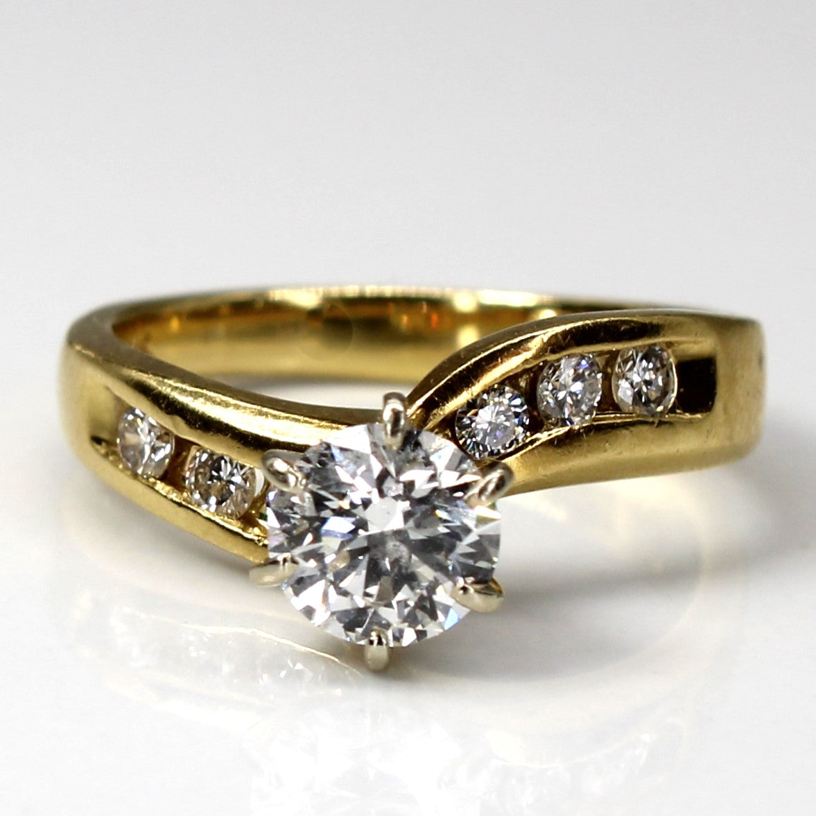 Solitaire with Channel Accents Gold Ring | 0.95ctw SI1 G/H | SZ 4.75 |