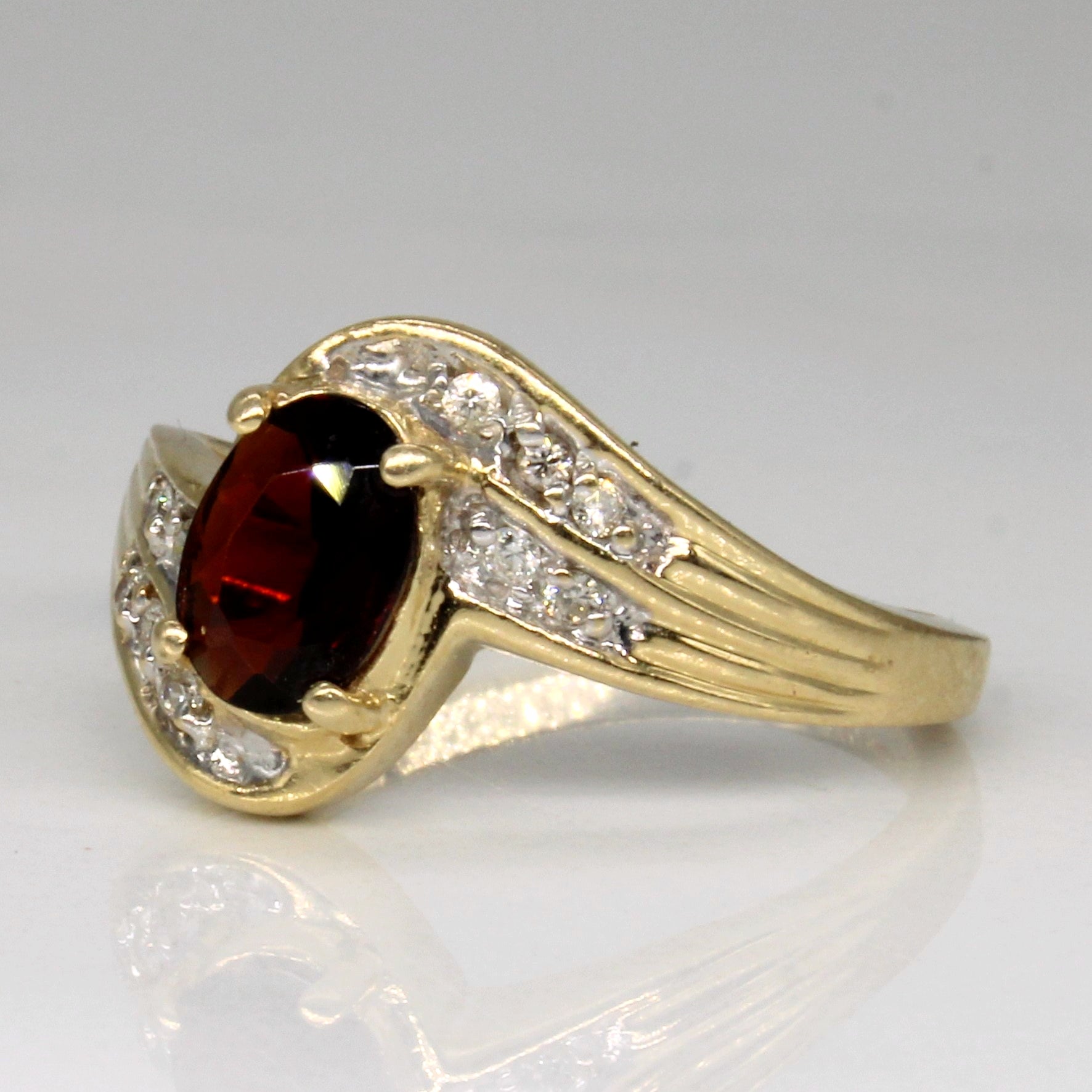 Garnet & Diamond Waterfall Ring | 0.67ct, 0.05ctw | SZ 6 |