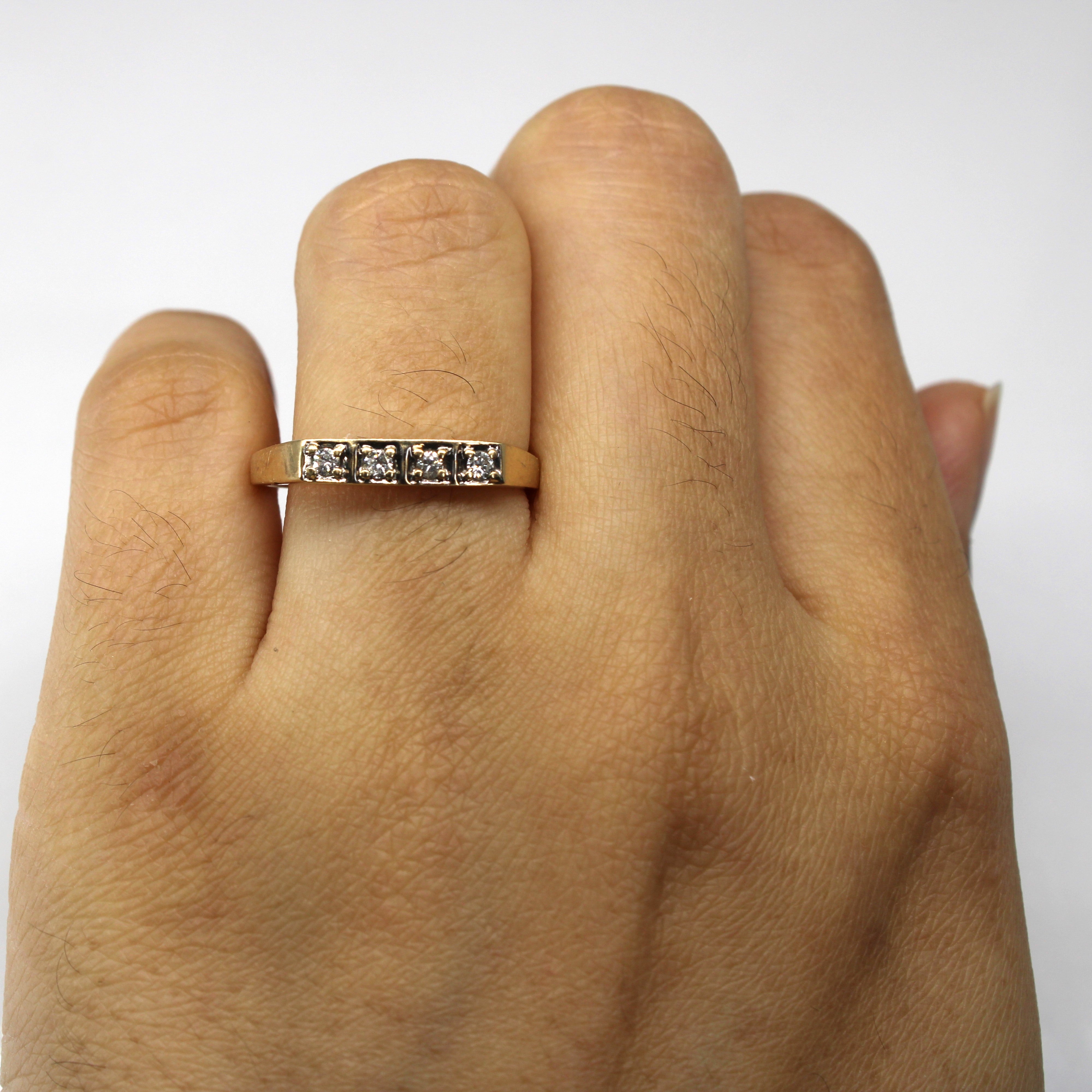 Four Stone Diamond Ring | 0.12ctw | SZ 7.75 |