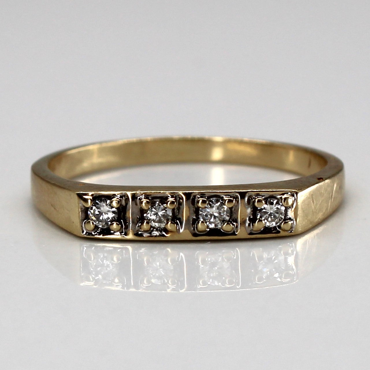 Four Stone Diamond Ring | 0.12ctw | SZ 7.75 |