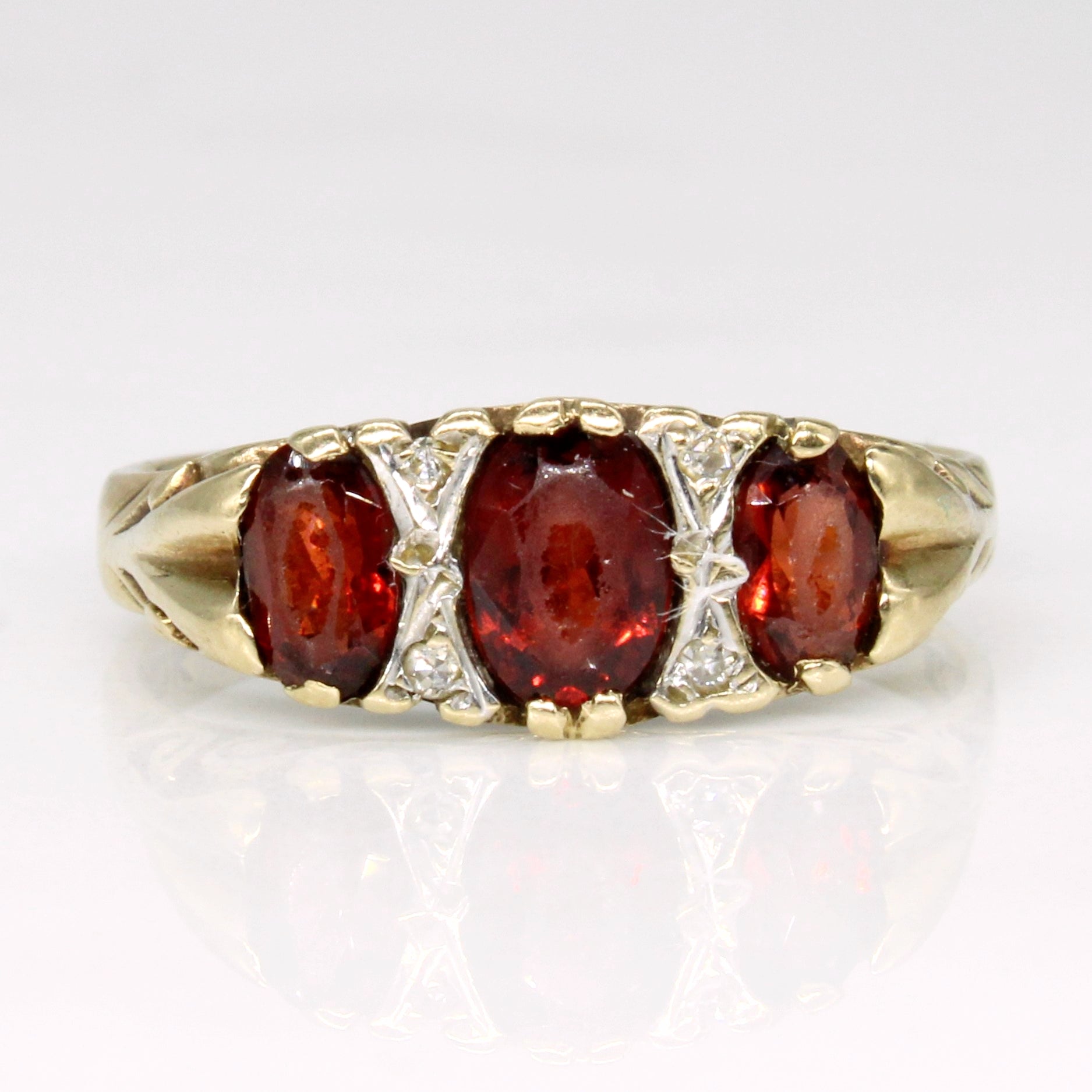 Garnet & Diamond  10k Ring | 1.00ctw, 0.02ctw | SZ 6.5 |