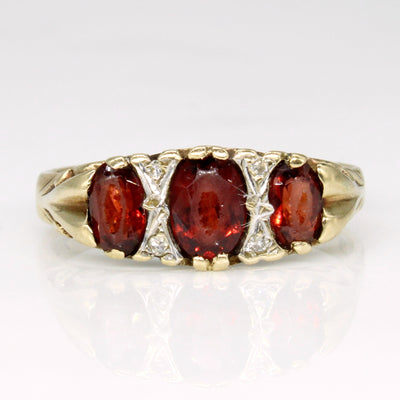 Garnet & Diamond  10k Ring | 1.00ctw, 0.02ctw | SZ 6.5 |
