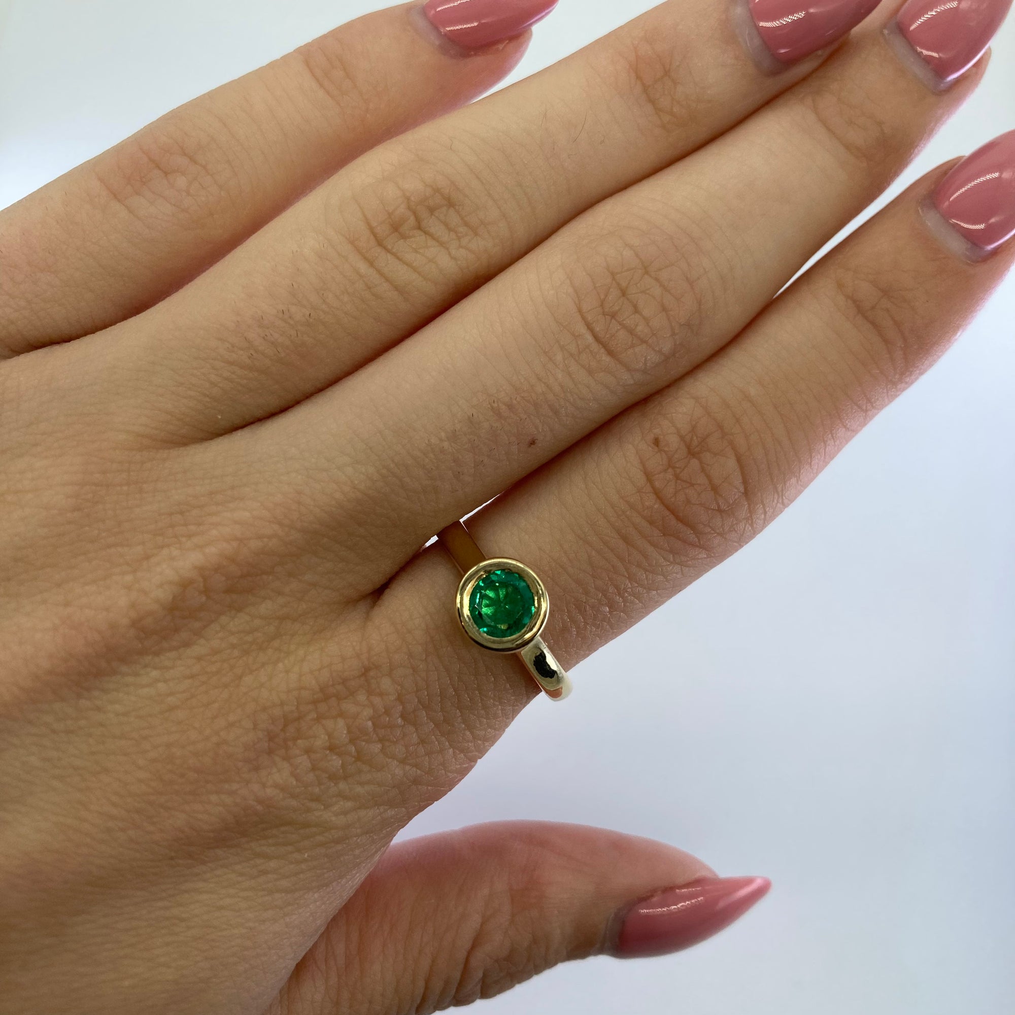 '100 Ways' Bezel Set Emerald Solitaire | 0.56 ct | SZ 6.75 |