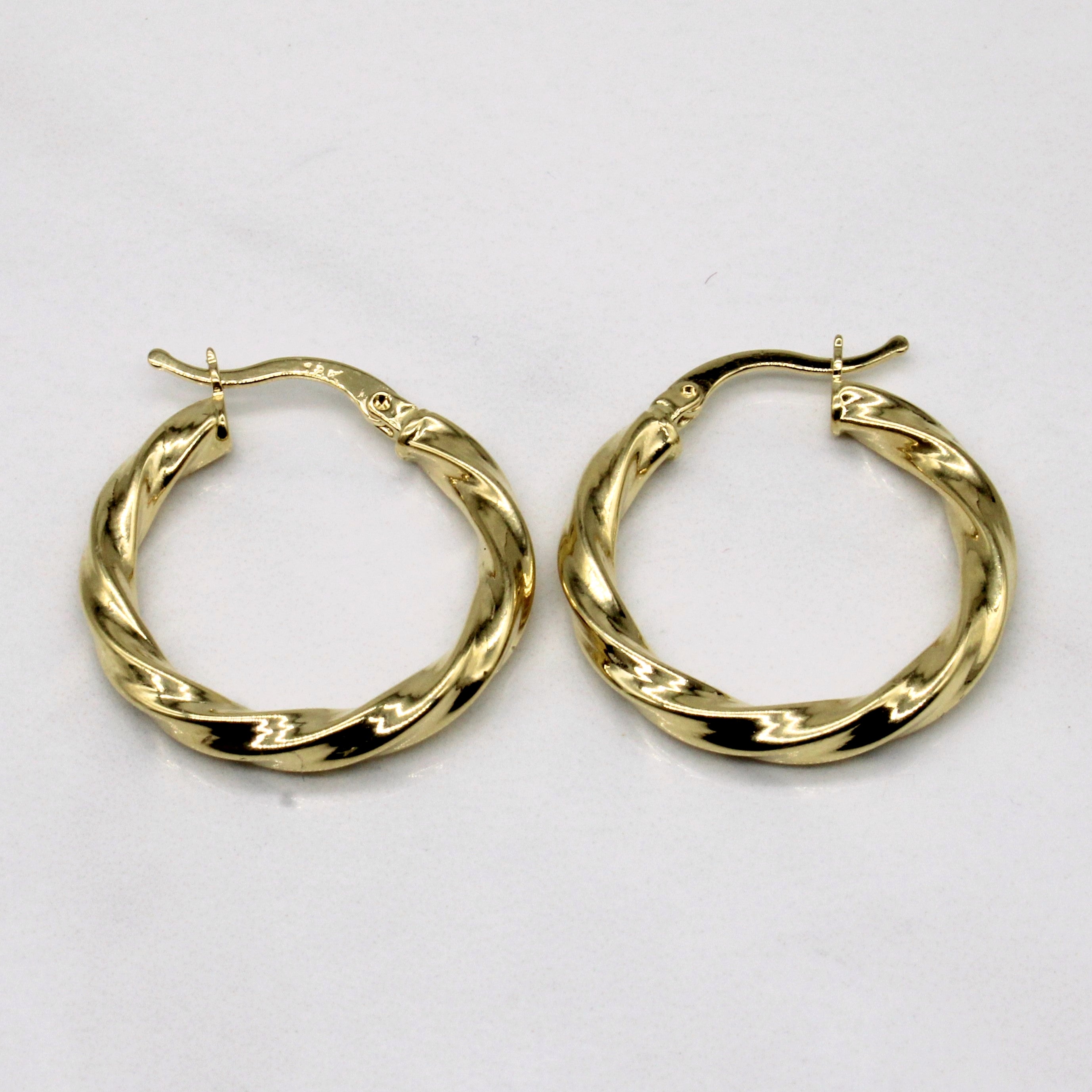 Boucles d'oreilles créoles torsadées en or jaune 18 carats 