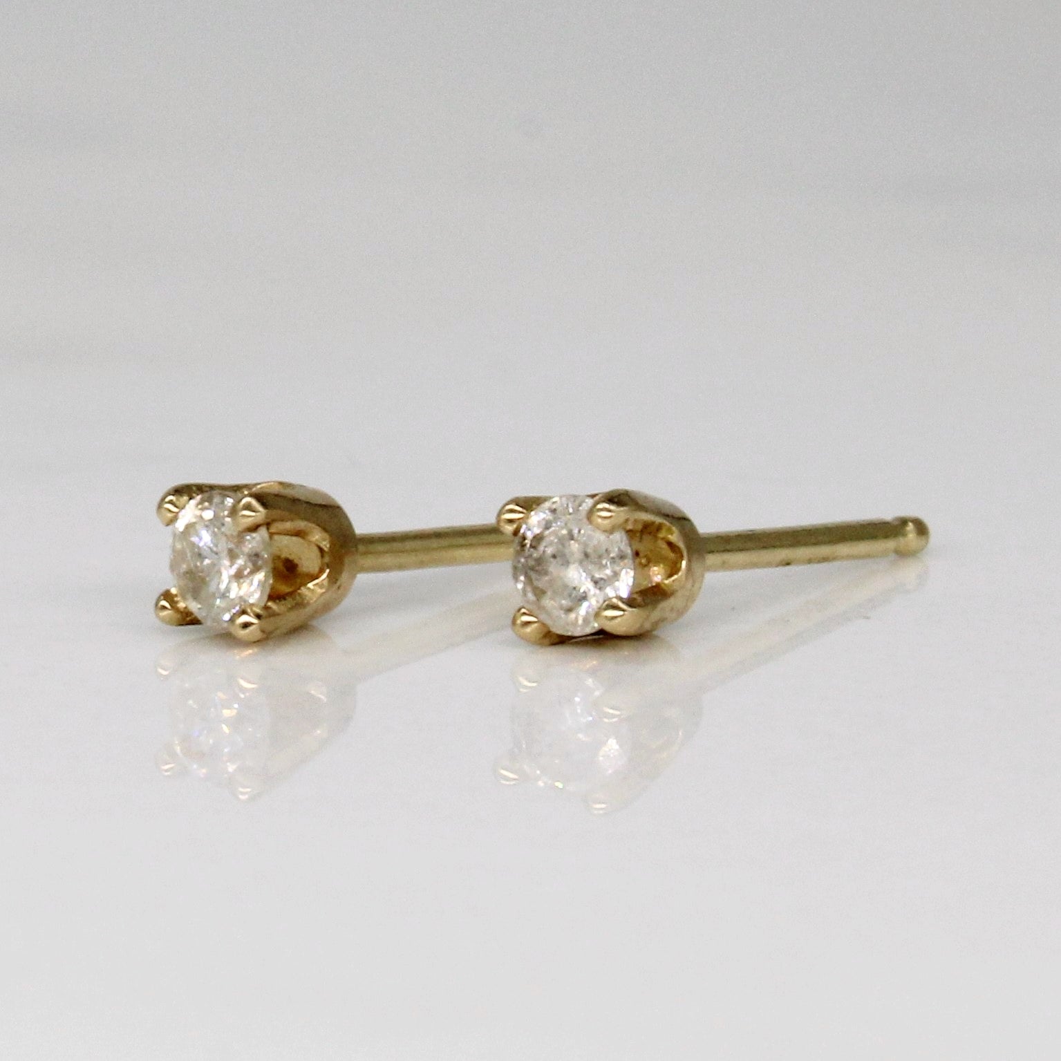 Boucles d'oreilles puces en or 14 carats avec diamants | 0,12 ct au total | 