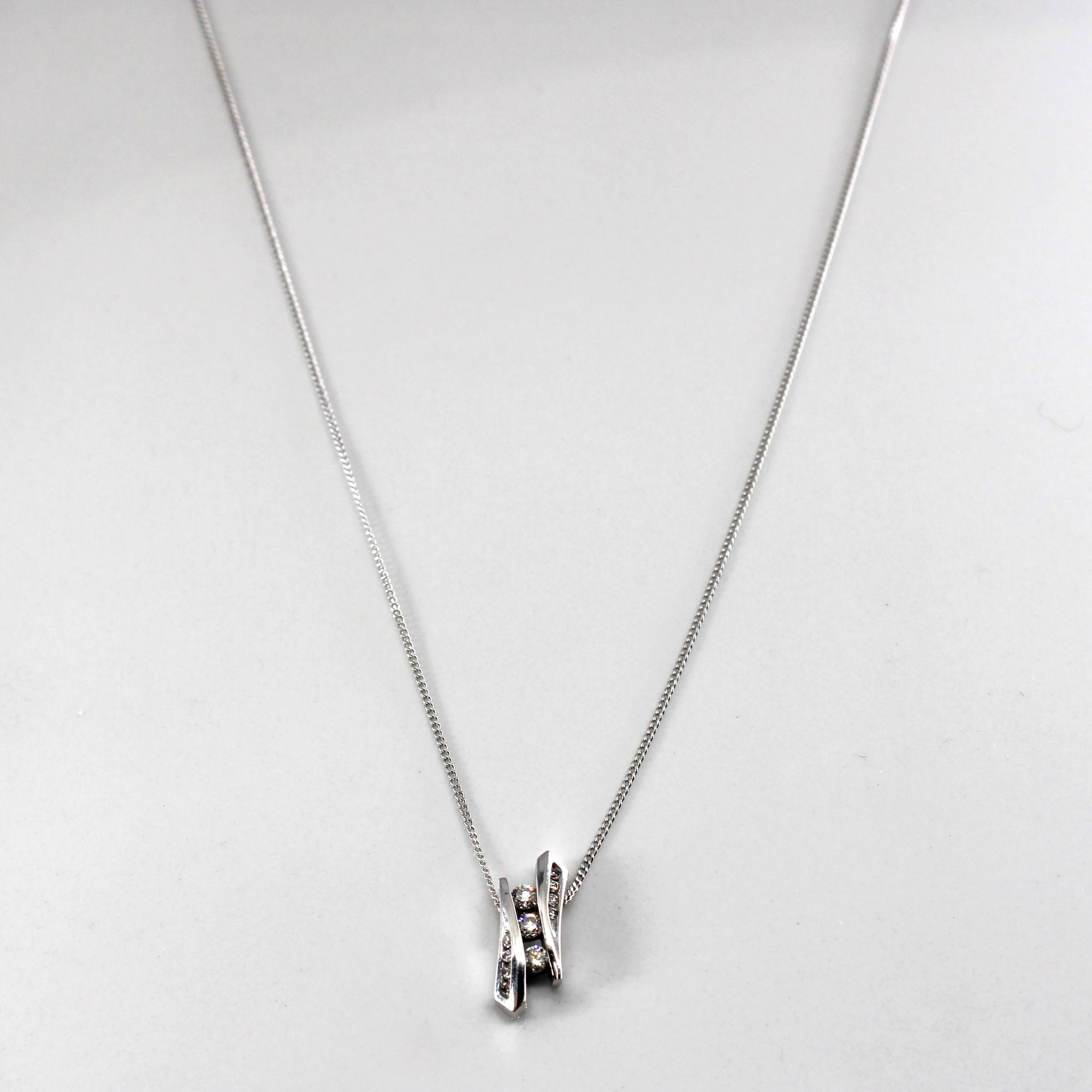 Tension Set Diamond Pendant Necklace | 0.15ctw | 18