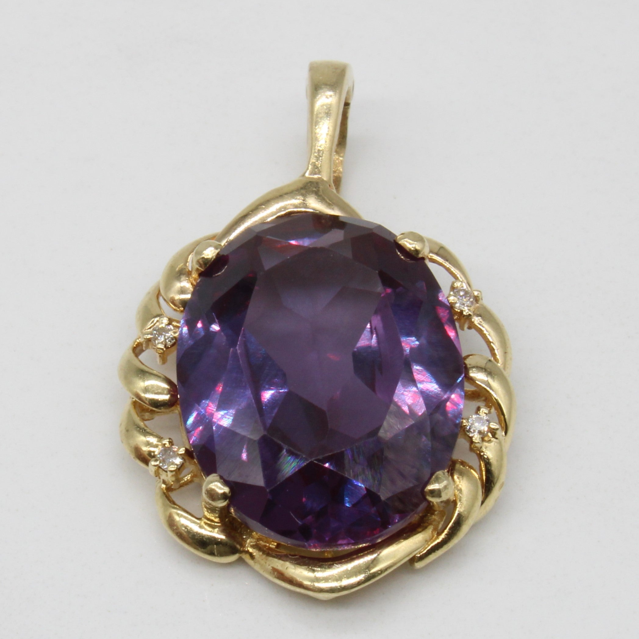 Synthetic Colour Change Sapphire & Diamond Pendant | 18.00ct, 0.04ctw |