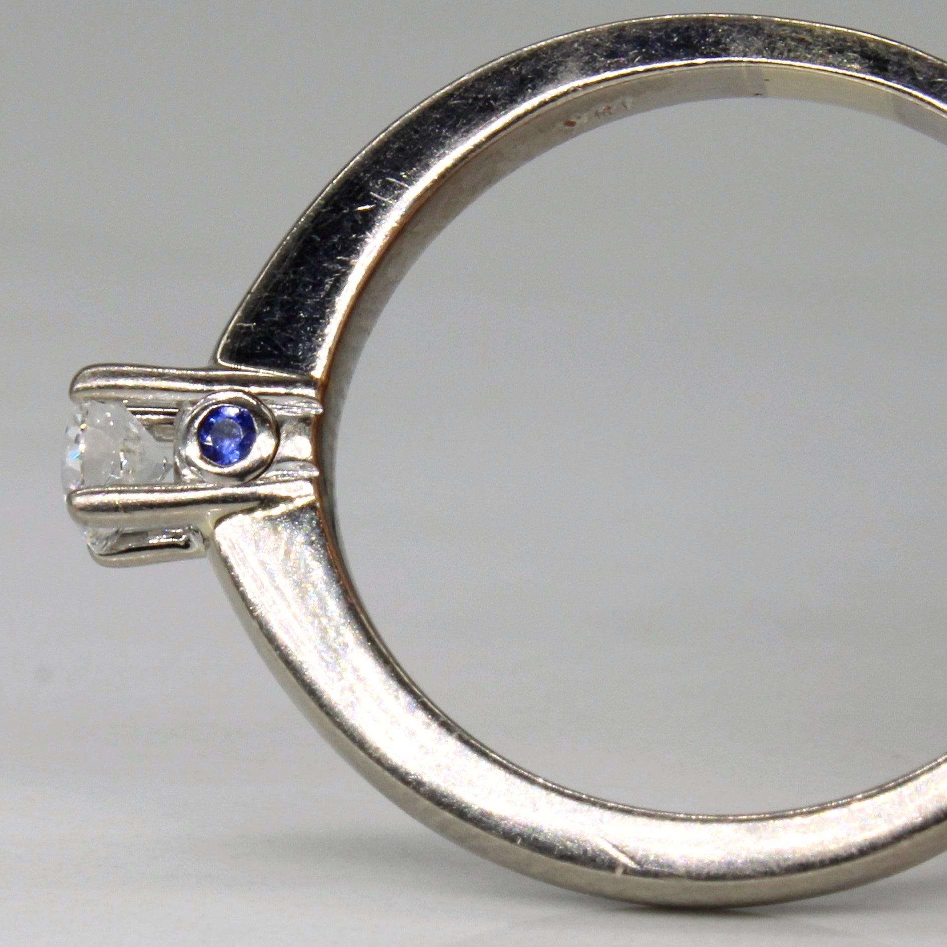 Diamond Solitaire with Hidden Sapphire 10k Ring | 0.22ctw, 0.01 ctw | SZ 6.75 |